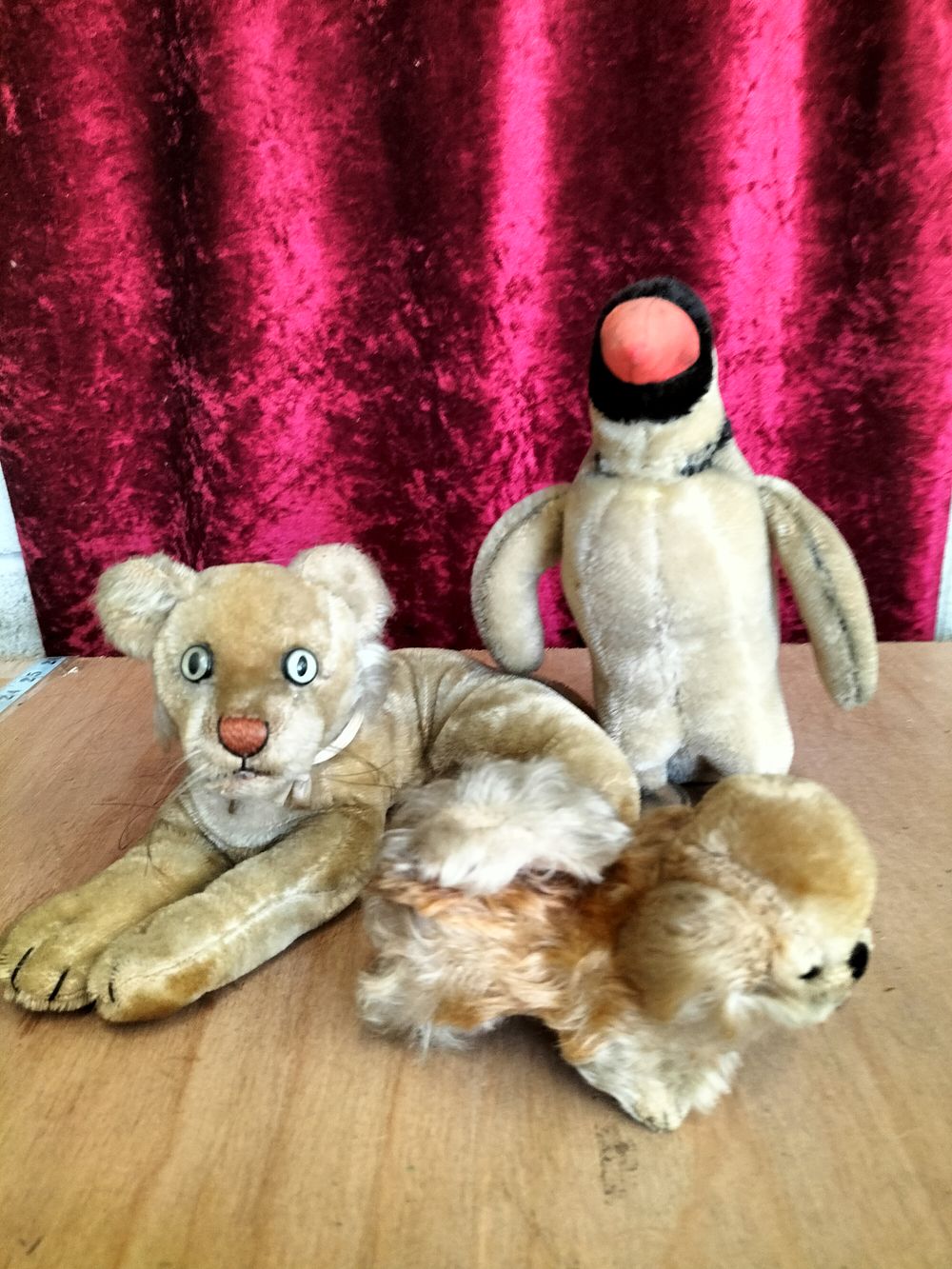 Lot 180 – A Trio of Vintage Mohair Soft Toys including a Lioness, Peggy Penguin, and Dog attributed to Steiff