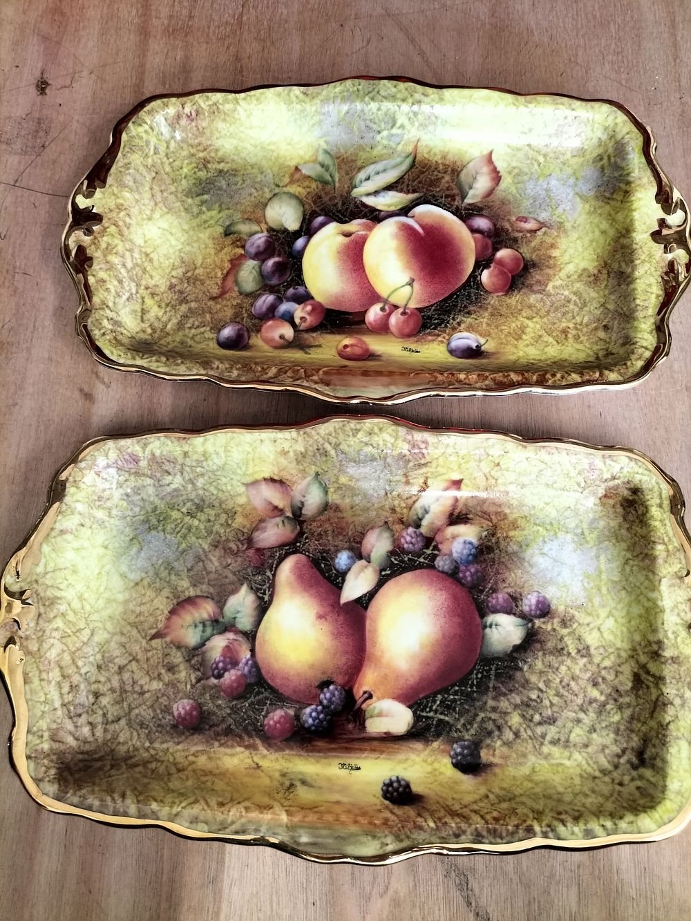 Lot 188 – A Pair of Hand-Painted Porcelain Fruit Trays Signed J.H. Stubbs