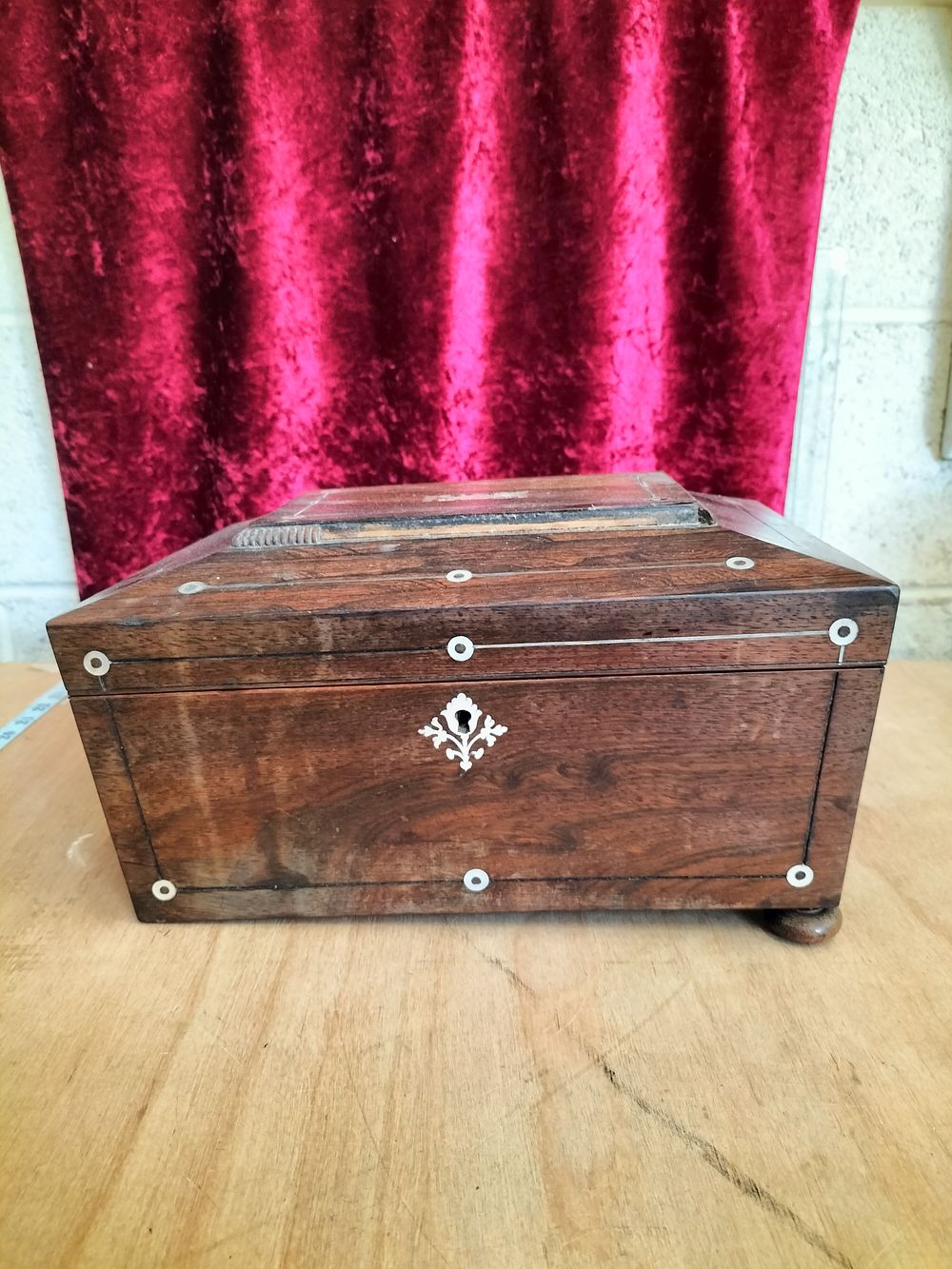 Lot 191 – A Victorian Rosewood and Mother-of-Pearl Inlaid Sarcophagus-Shaped Work Box