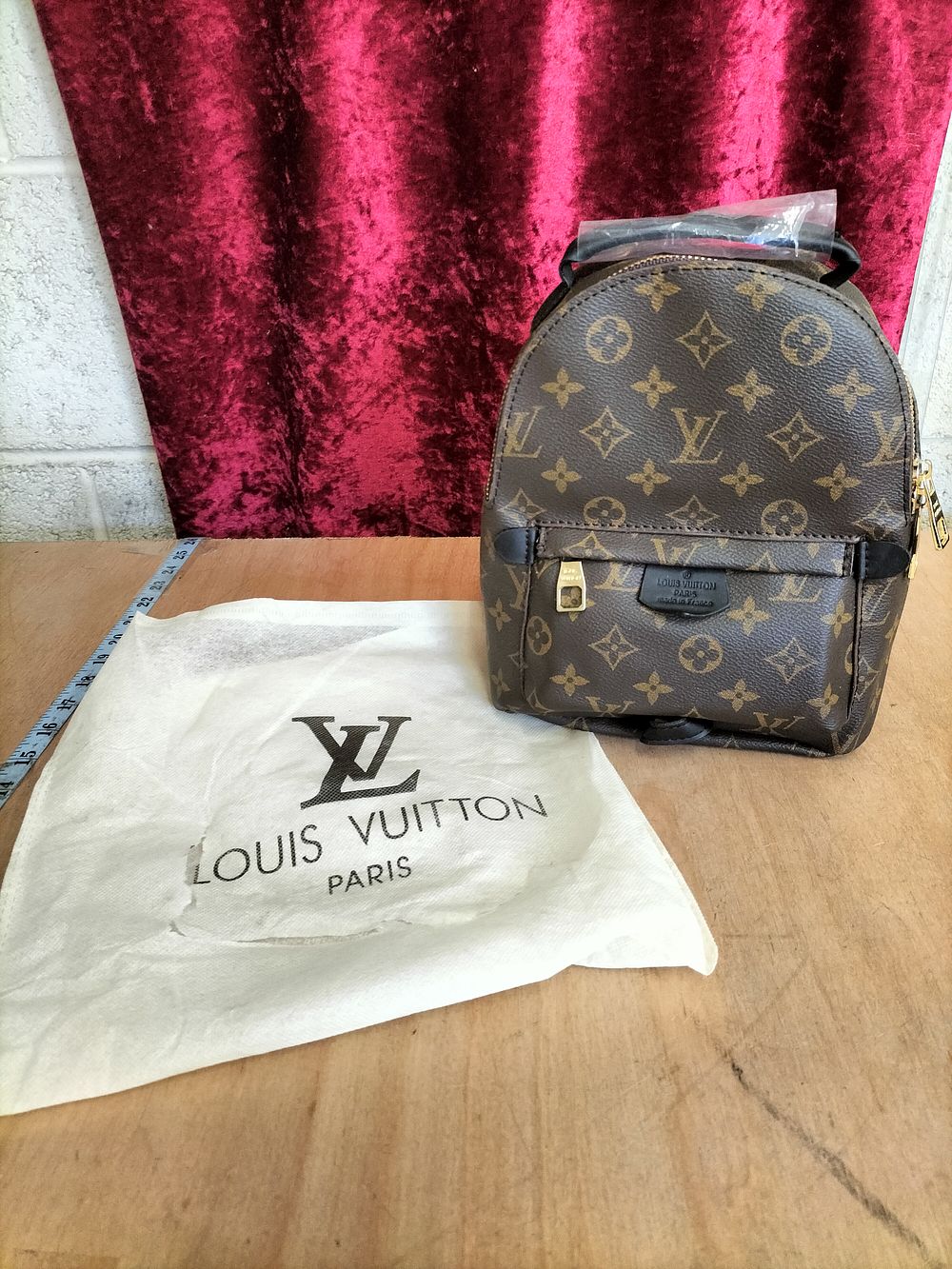 Lot 194 – A Palm Springs Mini backpack in Monogram coated canvas