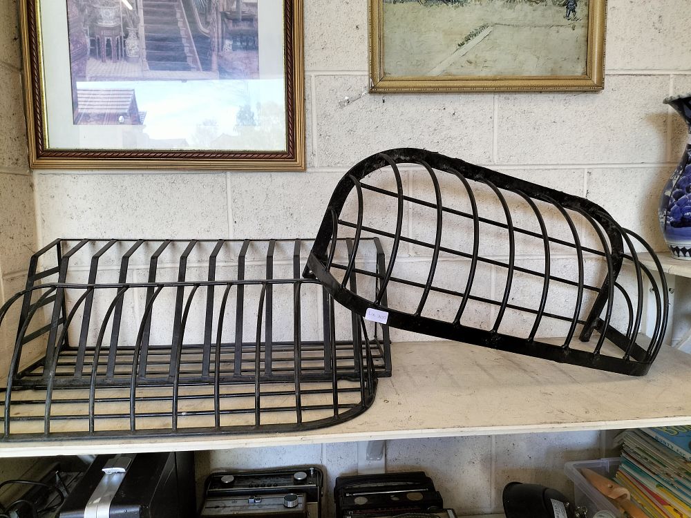 Lot 200 – Three Vintage Wrought Iron Wall-Mounted Hay Racks