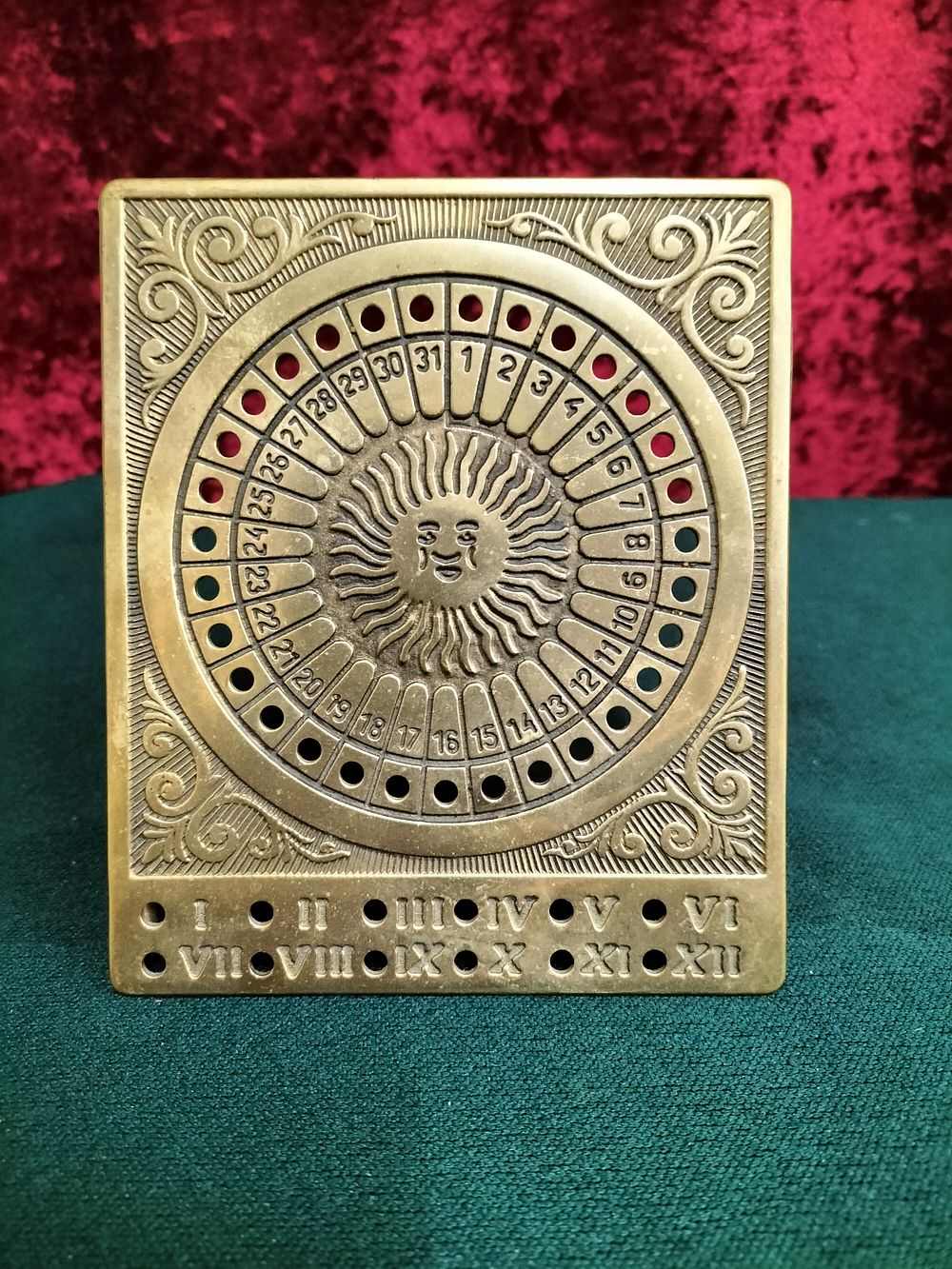 Lot 164 – Vintage Brass Perpetual Sun Motif Desk Calendar in the Italian Style
