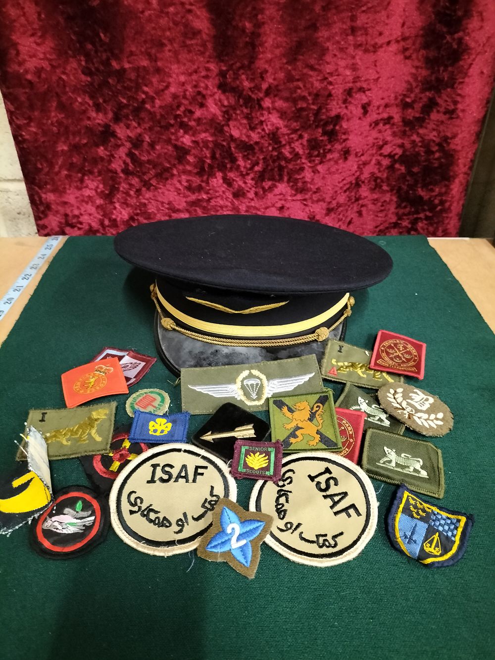 Lot 166 – A Collection of Military and Commercial Aviation Headgear and Cloth Insignia including ISAF and Formation Signs