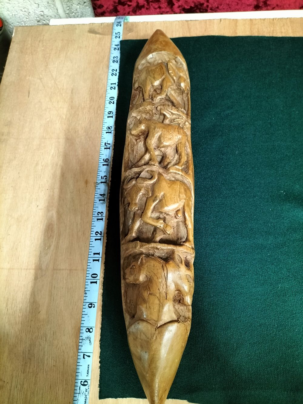Lot 187 – A Large Hand-Carved Wood Decorative Tusk Featuring African Wildlife Relief