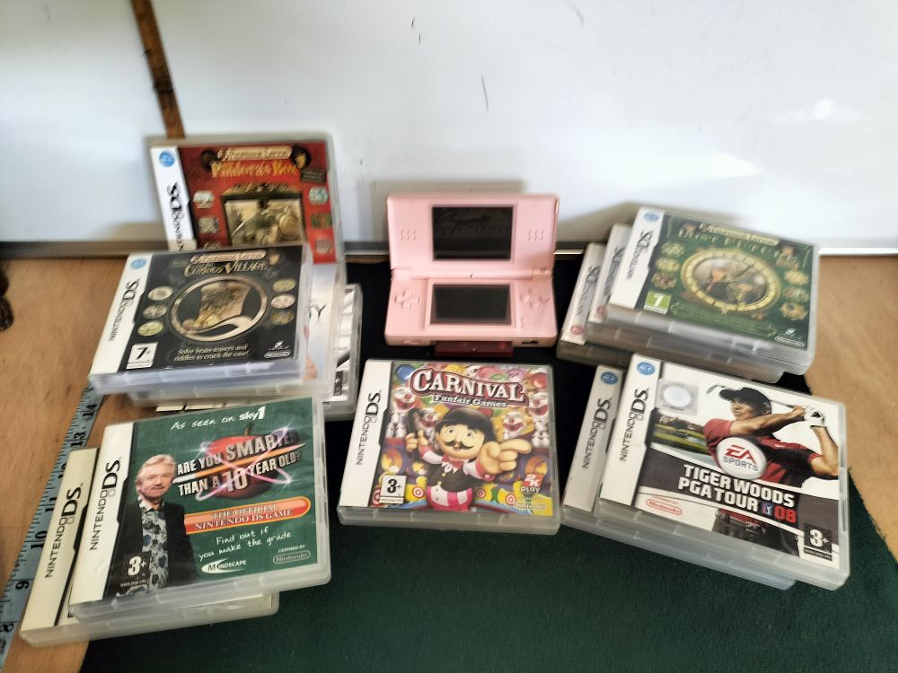 Lot 176 – A Nintendo DS Lite Handheld Console and a Collection of Nintendo DS Games