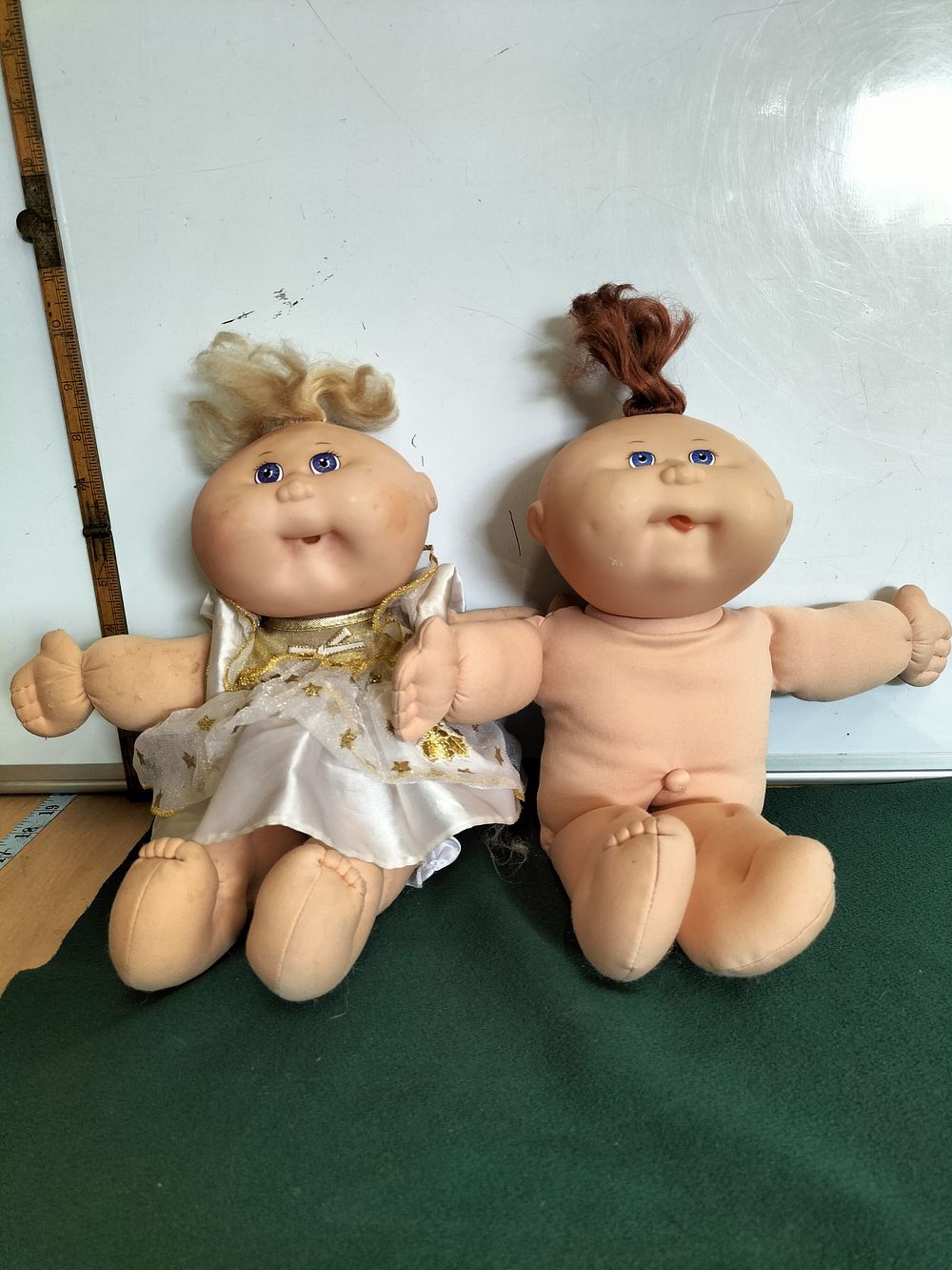 Lot 180 – A Pair of Soft-Sculpture Dolls in the Style of Cabbage Patch Kids