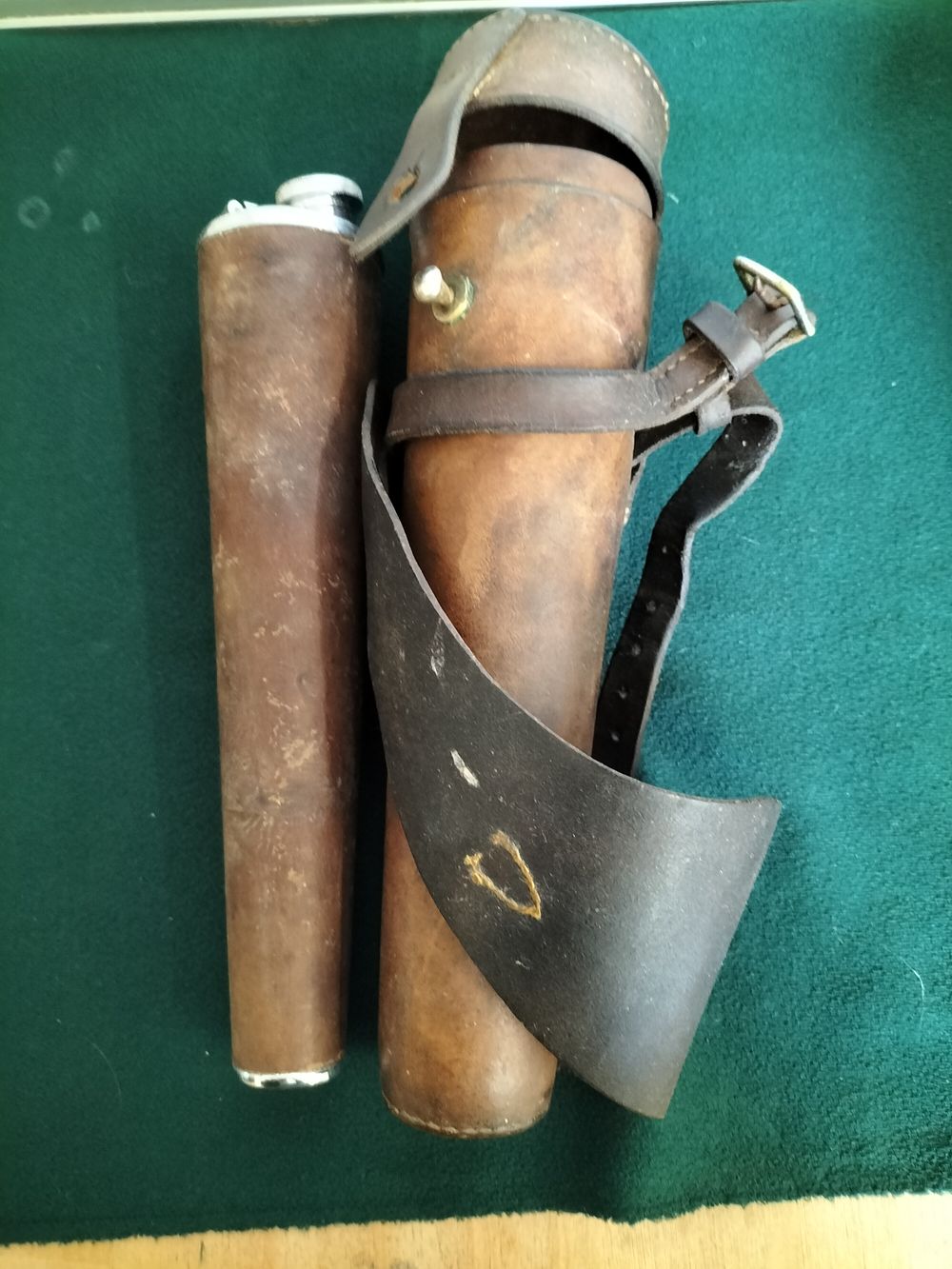 Lot 182 – An Early 20th-century Leather-cased Glass Hunting Flask with Leather Saddle Holster