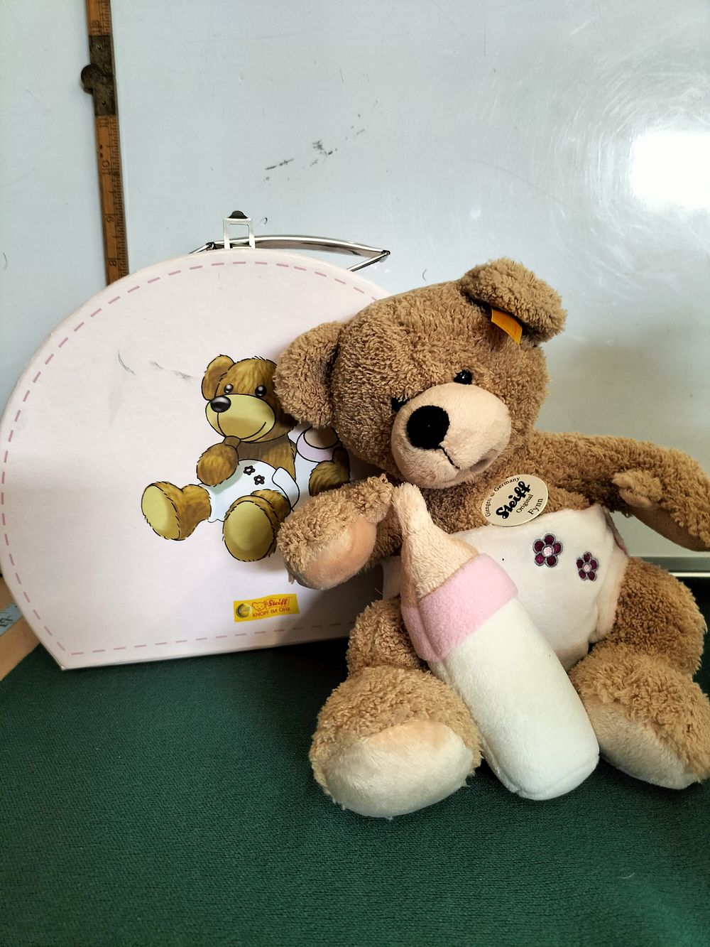 Lot 187 – Steiff Fynn Teddy Bear in Pink Suitcase with Accessories