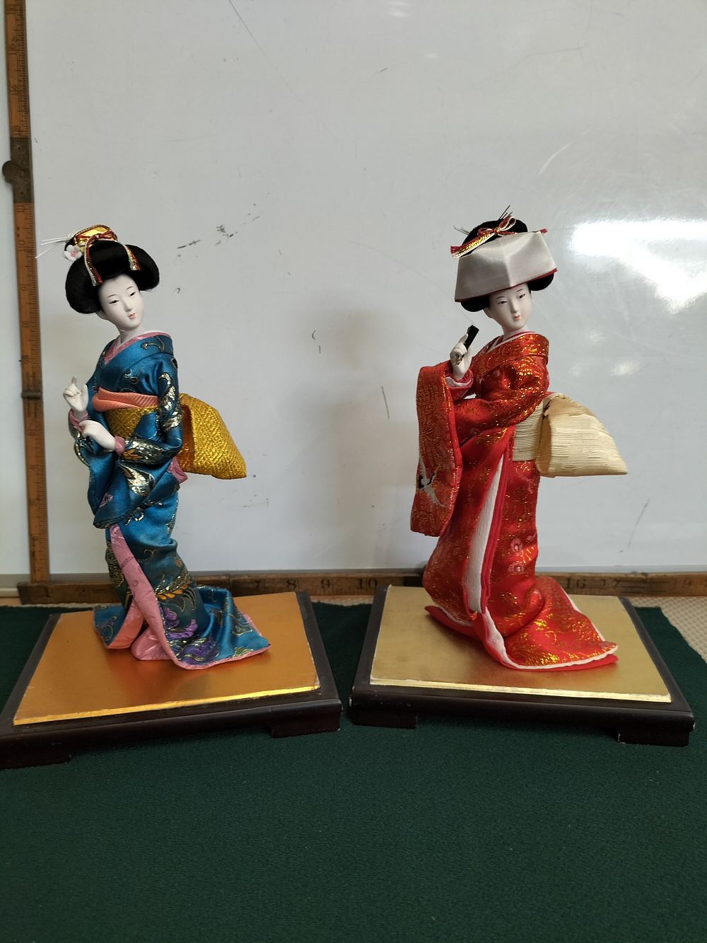 Lot 151 – A Pair of Japanese Showa Period Silk Brocade Costume Dolls on Gilded Bases