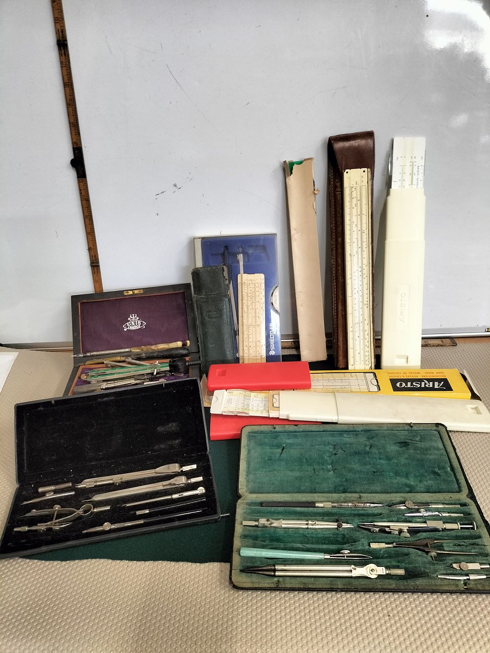 Lot 166 – A Collection of Vintage Drafting Sets and Slide Rules including UNIS France, Aristo and Staedtler