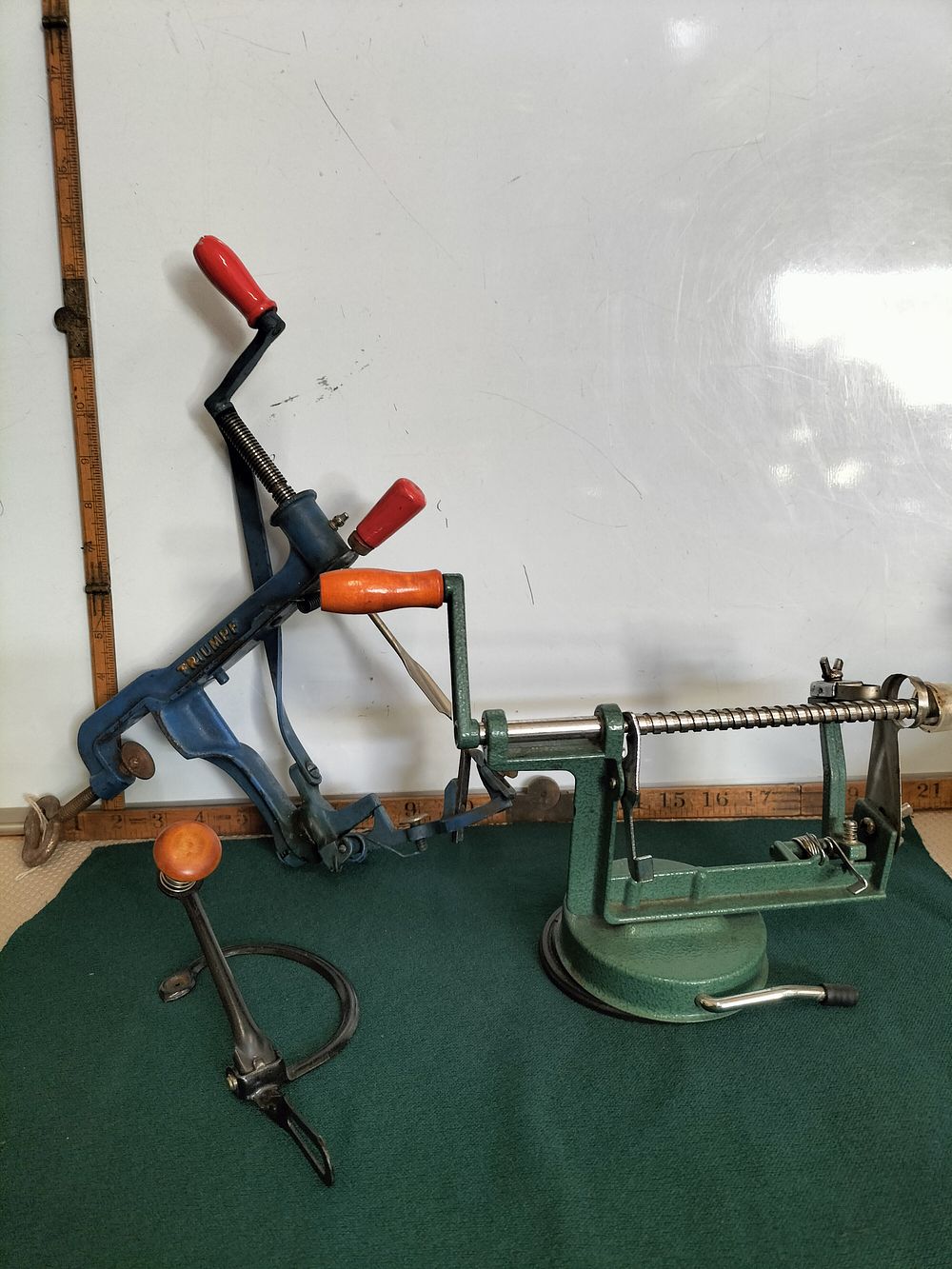 Lot 176 – A Trio of Vintage Mechanical Kitchen Tools including a Triumph Apple Peeler