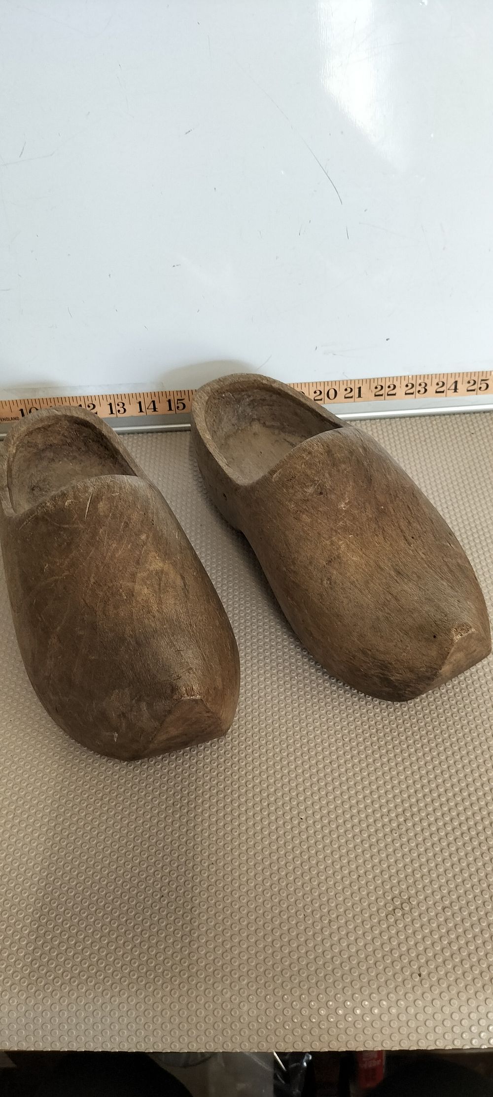 Lot 158 – A Pair of Antique Hand-Carved Wooden Clogs