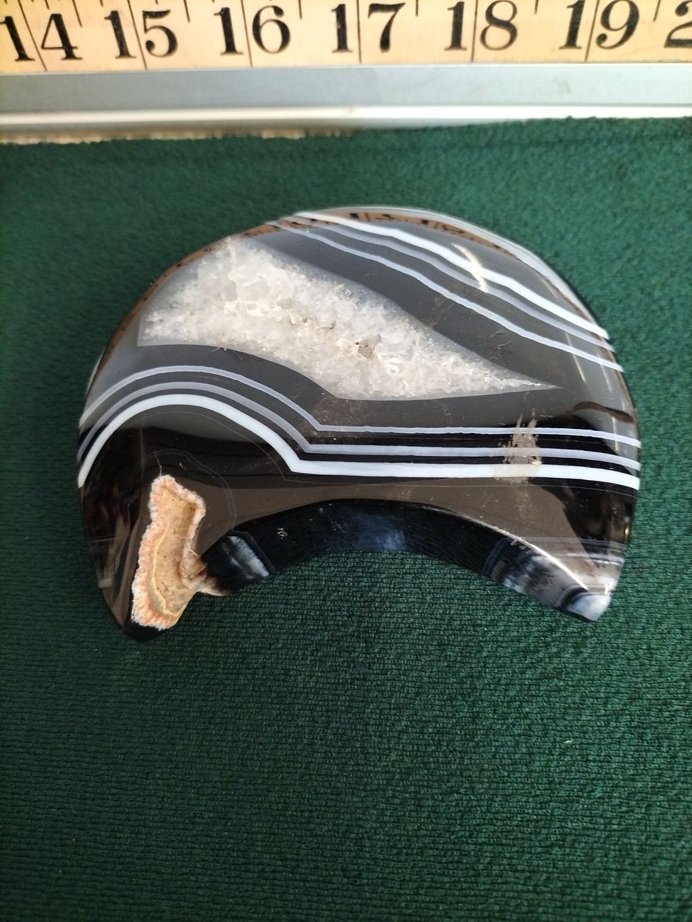 Lot 156 – A Polished Black and White Banded Agate Crescent Carving