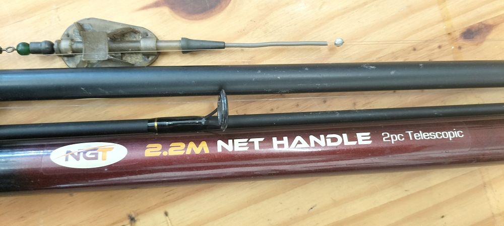 Lot 167 – A Collection of Coarse Fishing Tackle Featuring an Oakwood Carp Reel and NGT Net Handle