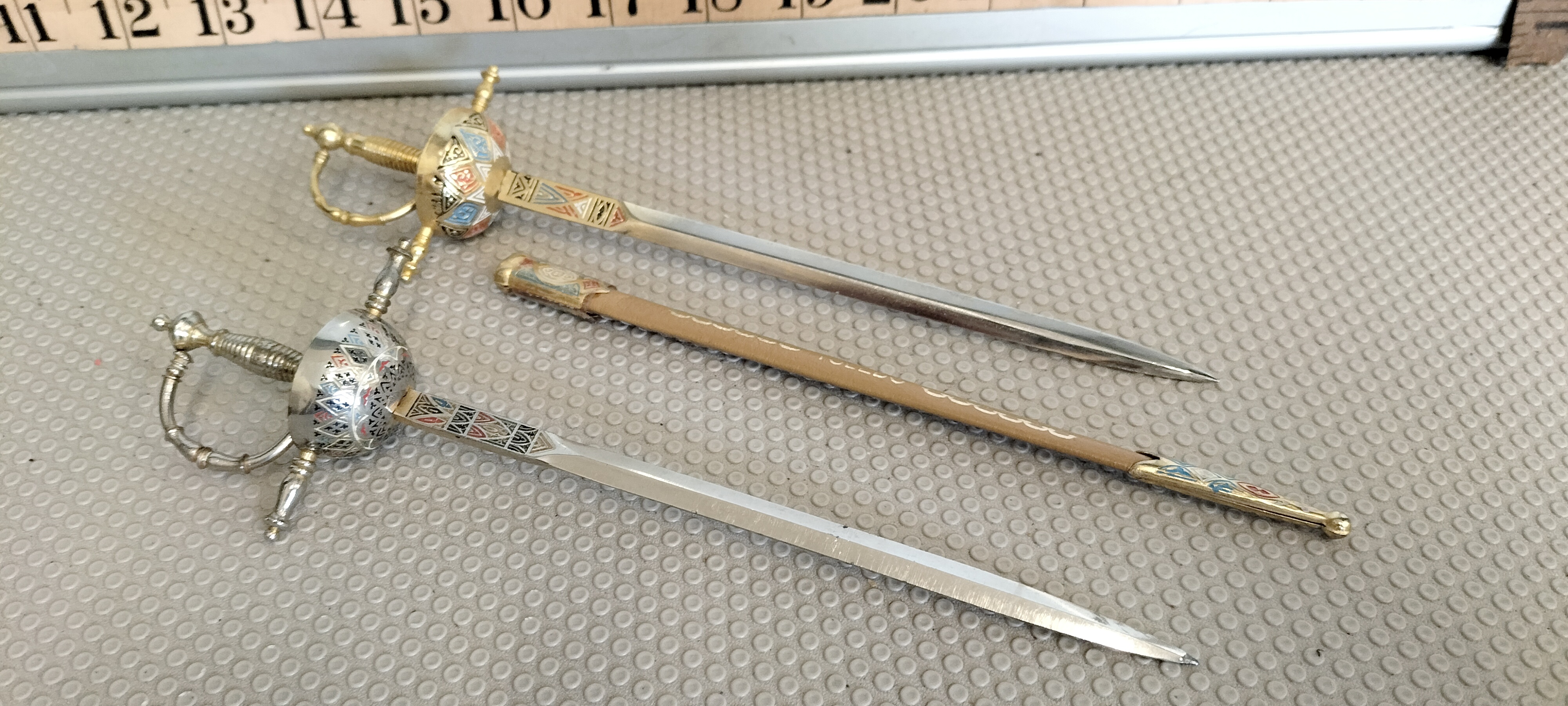 A Pair of Vintage Spanish Toledo Enamelled Miniature Rapier Letter Openers