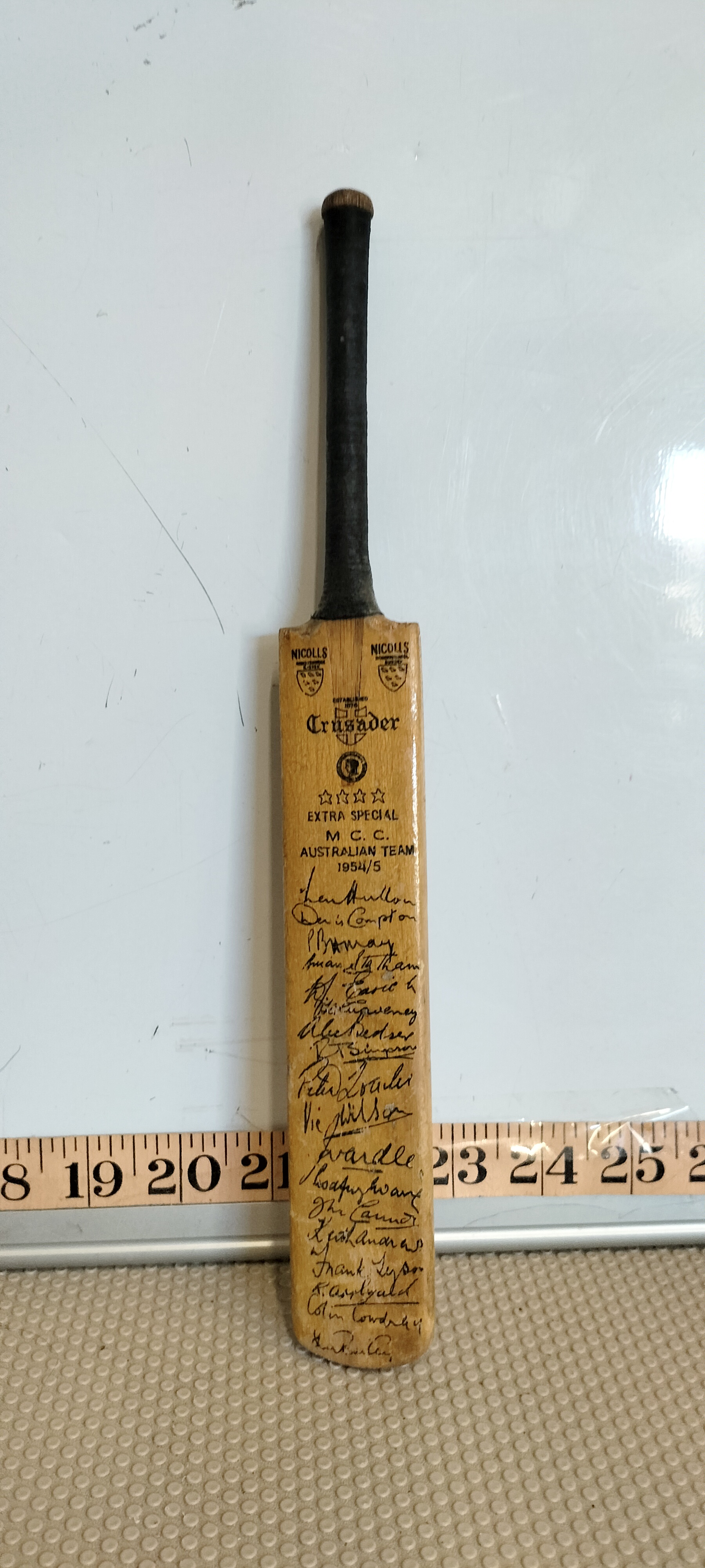 A Nicolls Crusader Miniature Cricket Bat Commemorating the 1954/5 M.C.C. Australian Tour