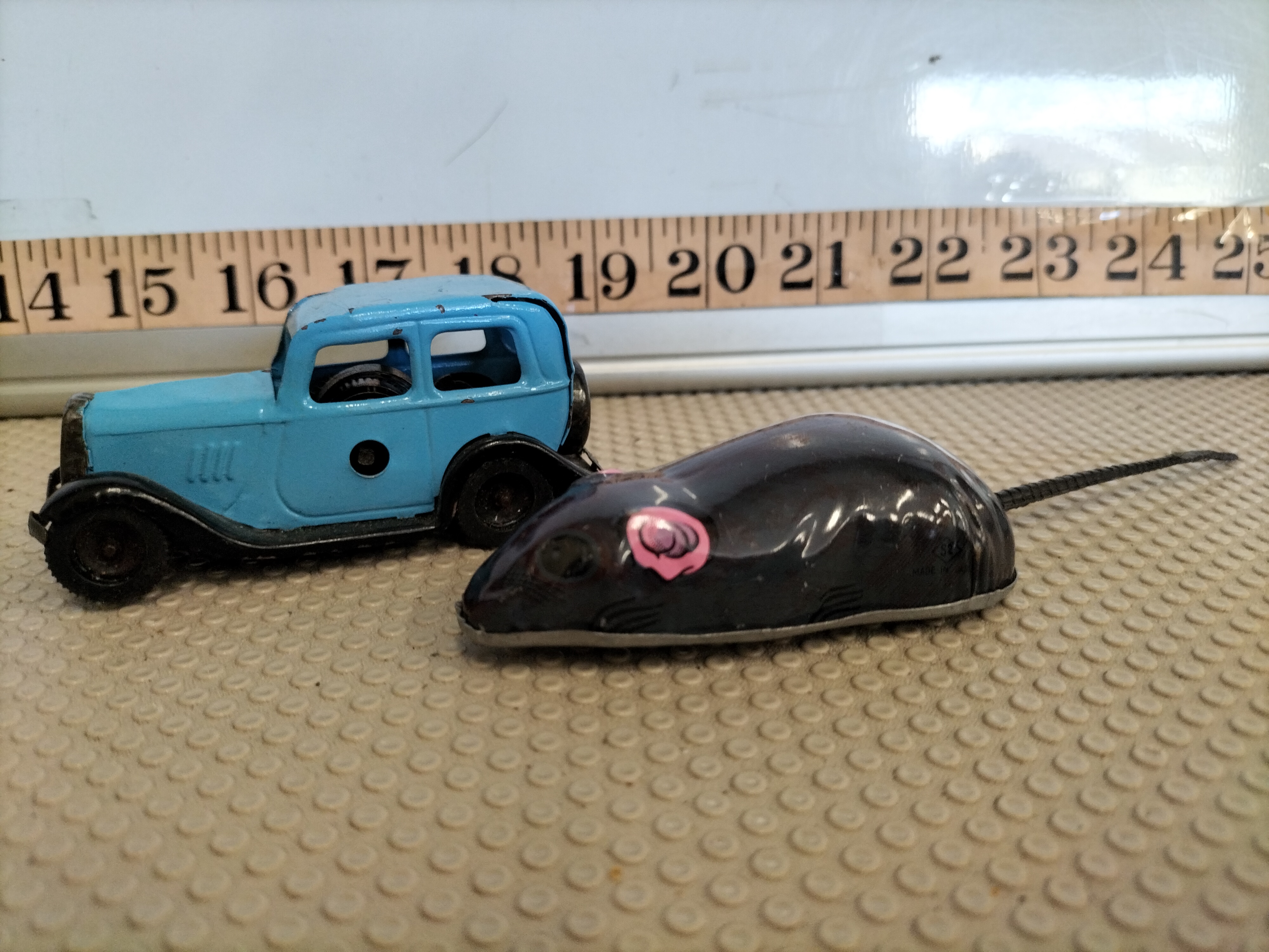 Two Vintage Tinplate Toys including a Clockwork Saloon Car and a Novelty Mouse
