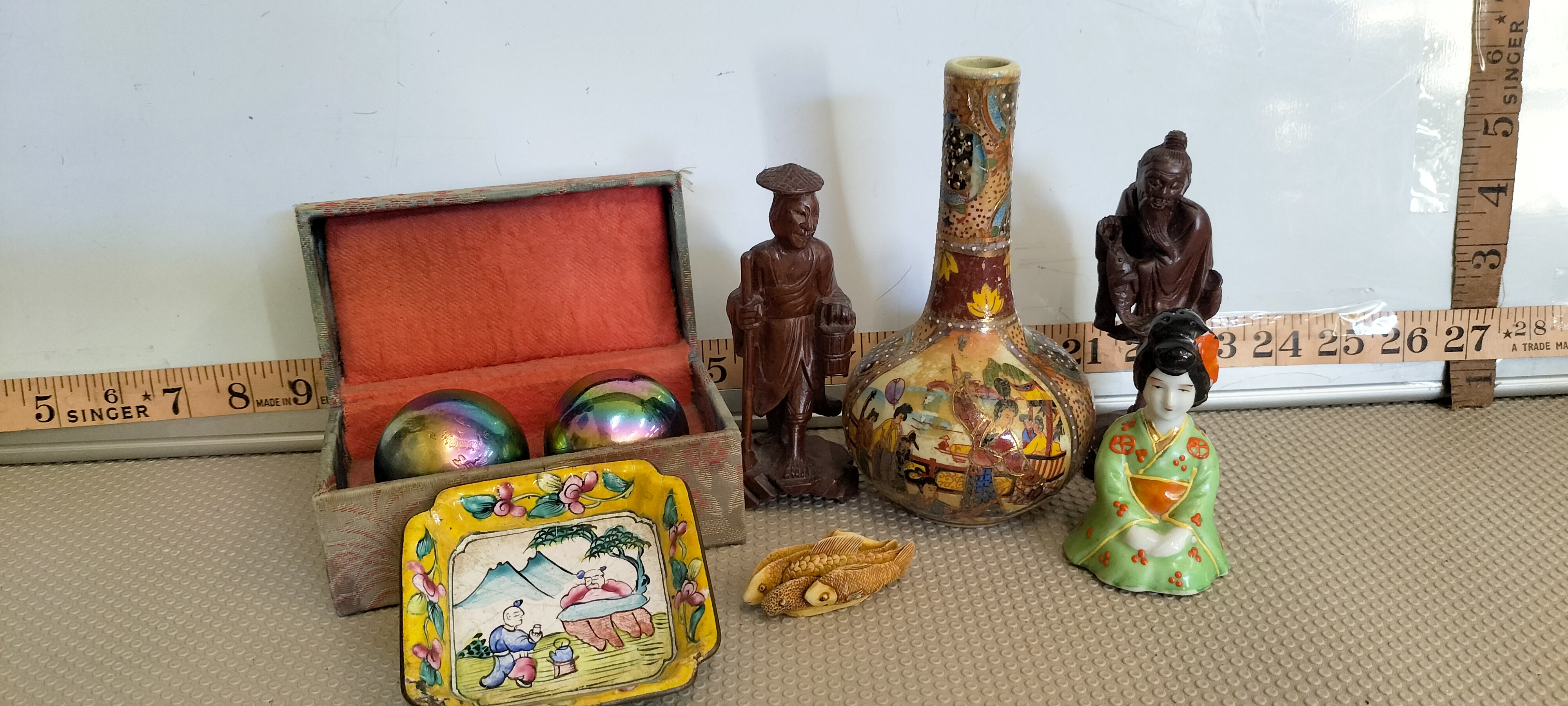 A Collection of Seven Assorted Asian Decorative and Collectible Items