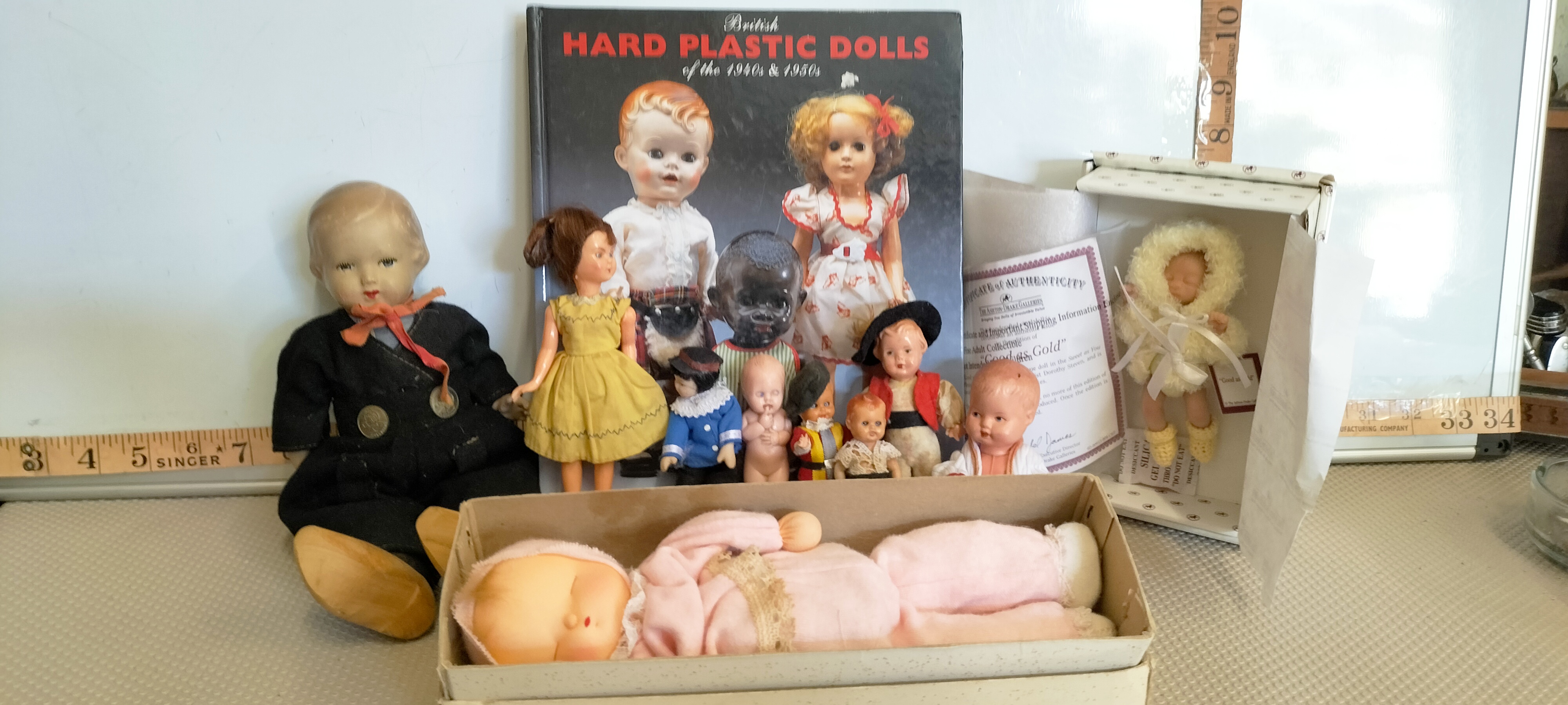 A Collection of Vintage and Modern Dolls and a Specialist Reference Book