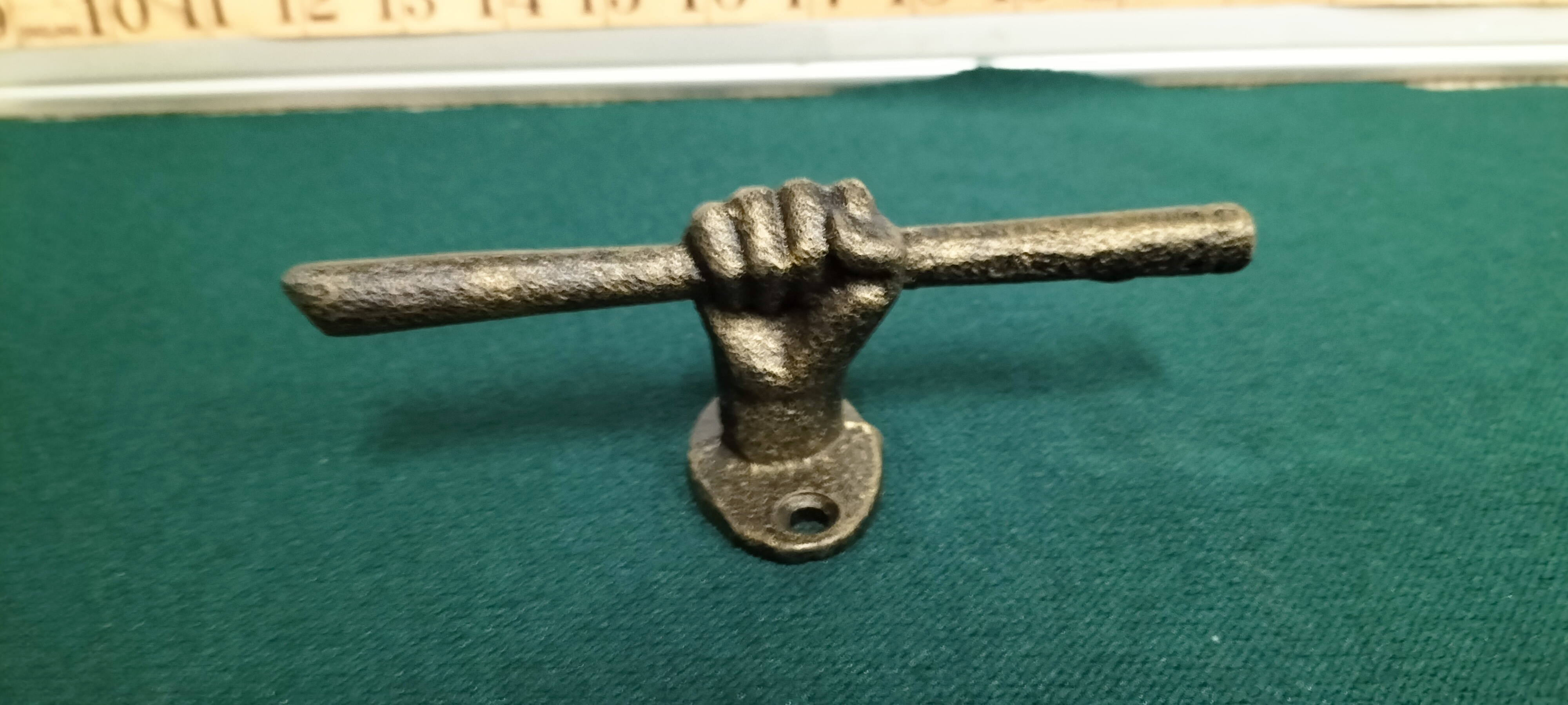 Cast Metal Decorative Wall Mount Handle in the Form of a Hand Holding a Baton
