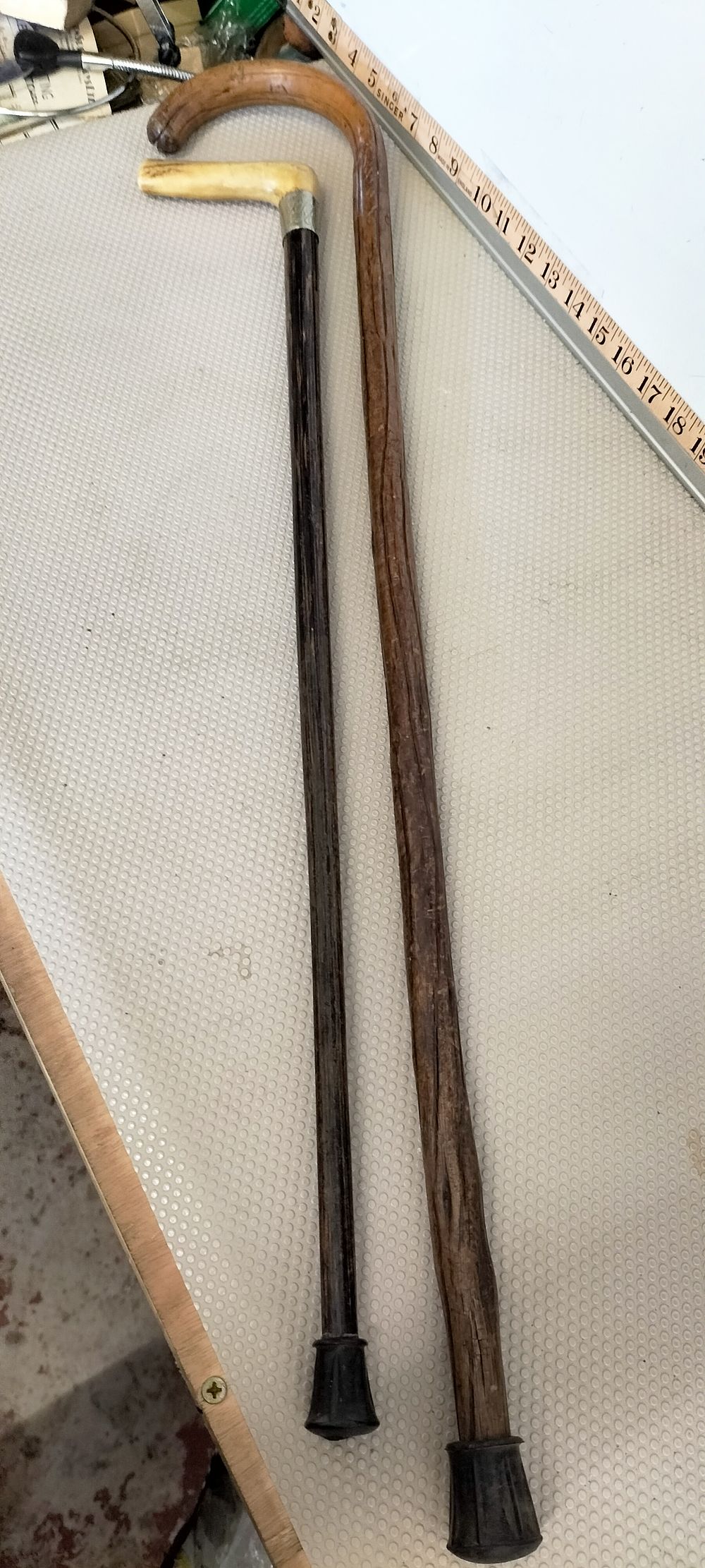 Lot 185 – Two late 19th to early 20th century walking sticks including a bone handled example