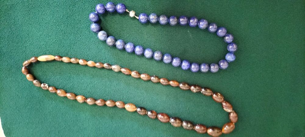 Lot 191 – Two semi-precious stone beaded necklaces comprising lapis lazuli and mixed brown agates