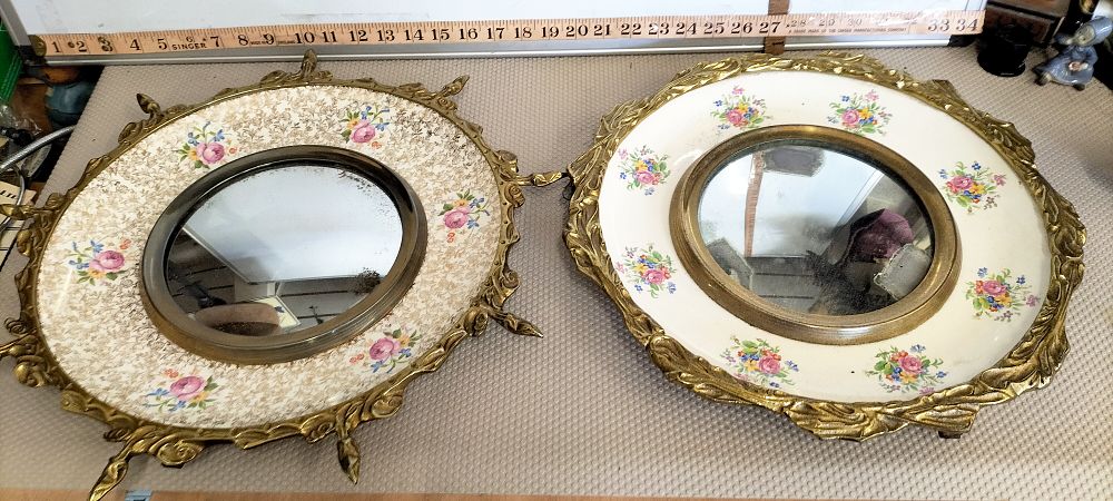 Lot 211 – A Pair of Vintage English Ceramic and Cast Metal Convex Wall Mirrors