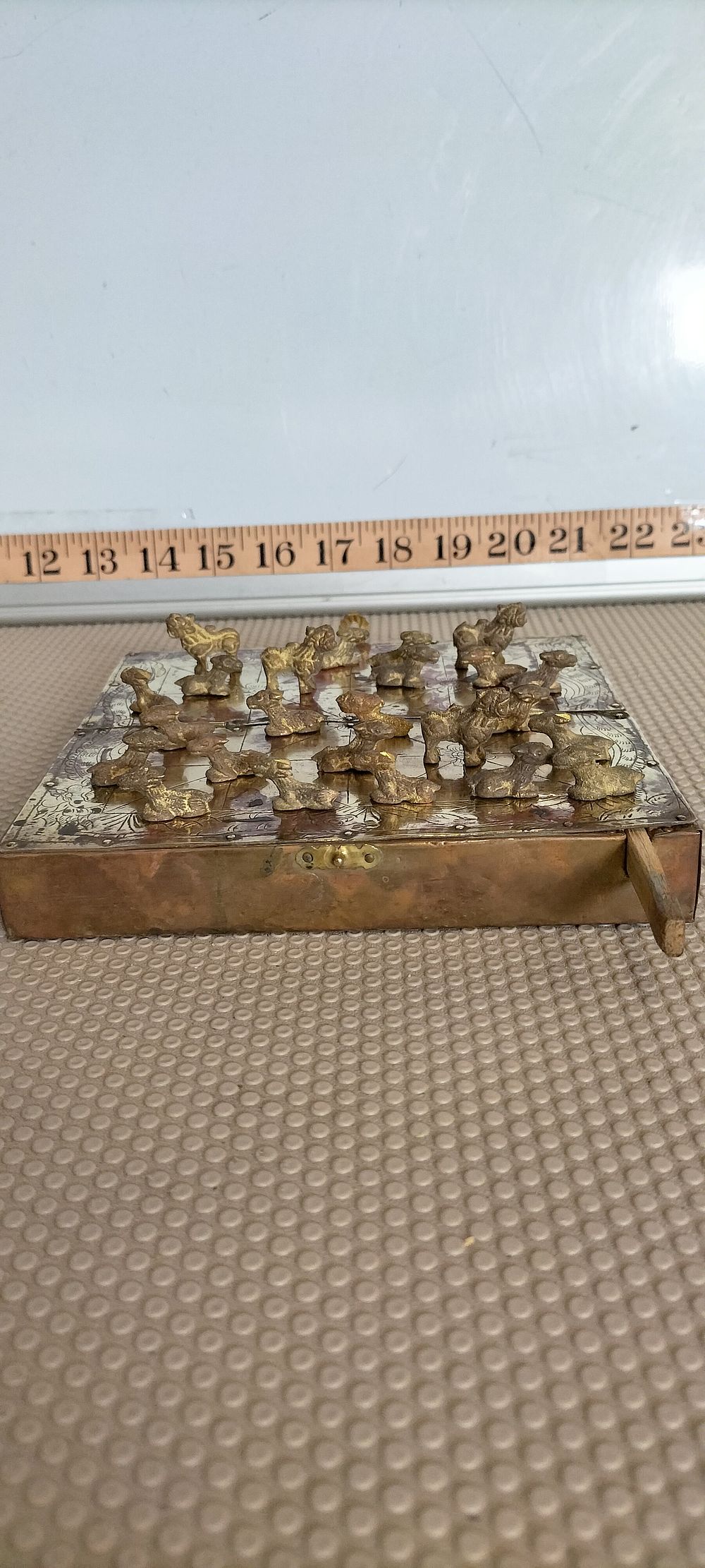 Lot 175 – A Himalayan Copper and Brass Bagh-Chal Game Set