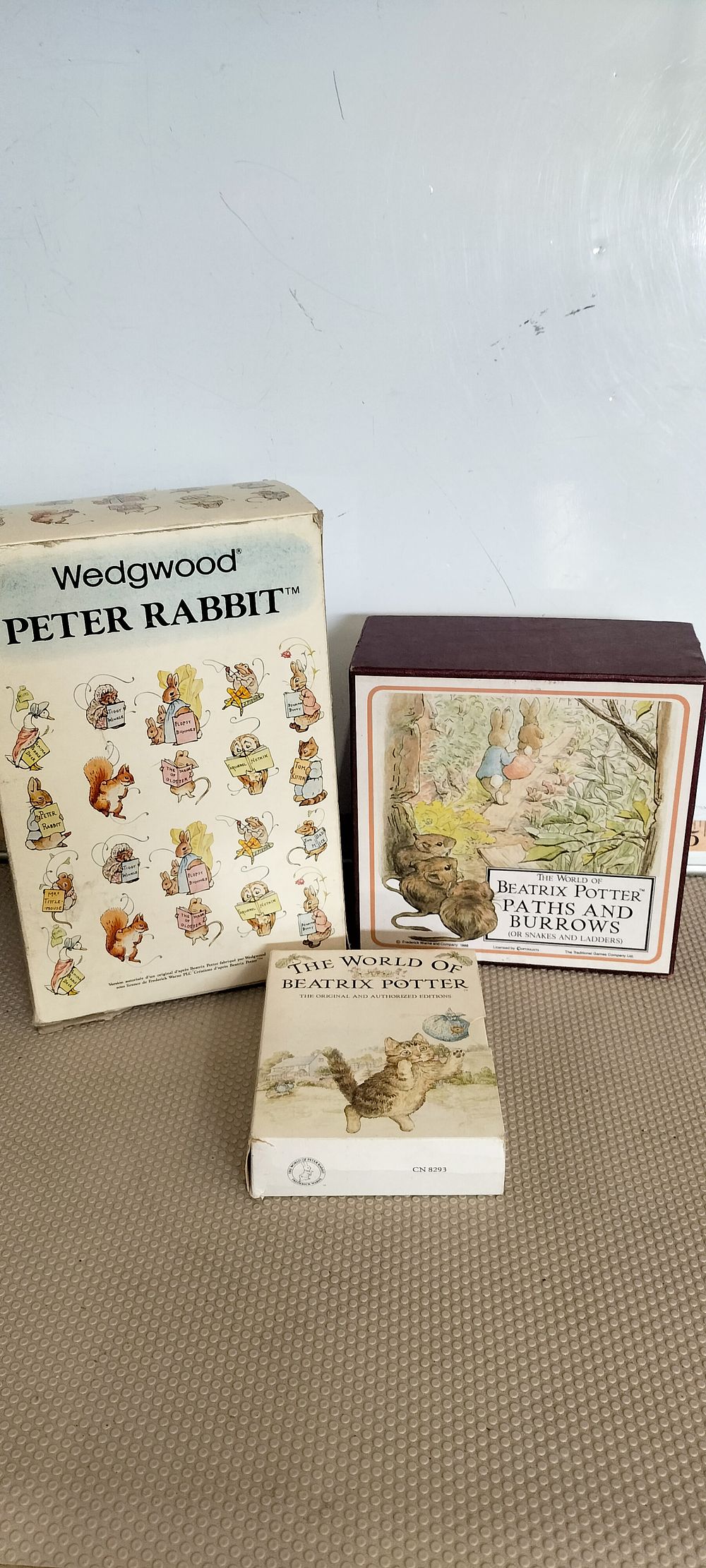 Lot 178 – A Collection of Beatrix Potter Memorabilia including Wedgwood Nursery Ware a Board Game and Books