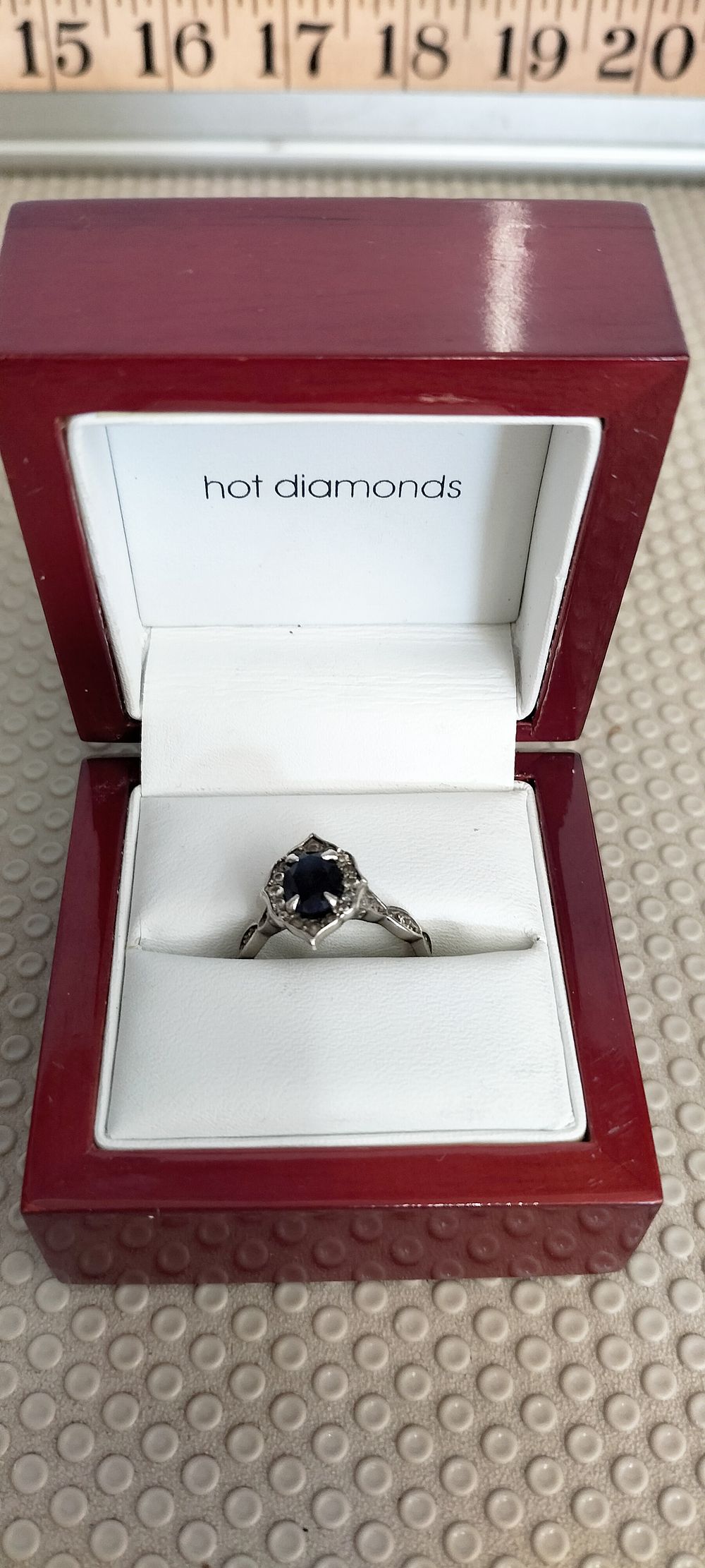 Lot 195 – Silver Simulated Sapphire and Diamond Dress Ring