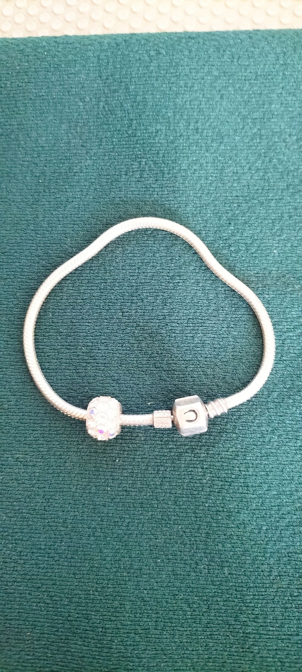 Lot 156 – Pandora Moments Silver Snake Chain Bracelet with Two Charms