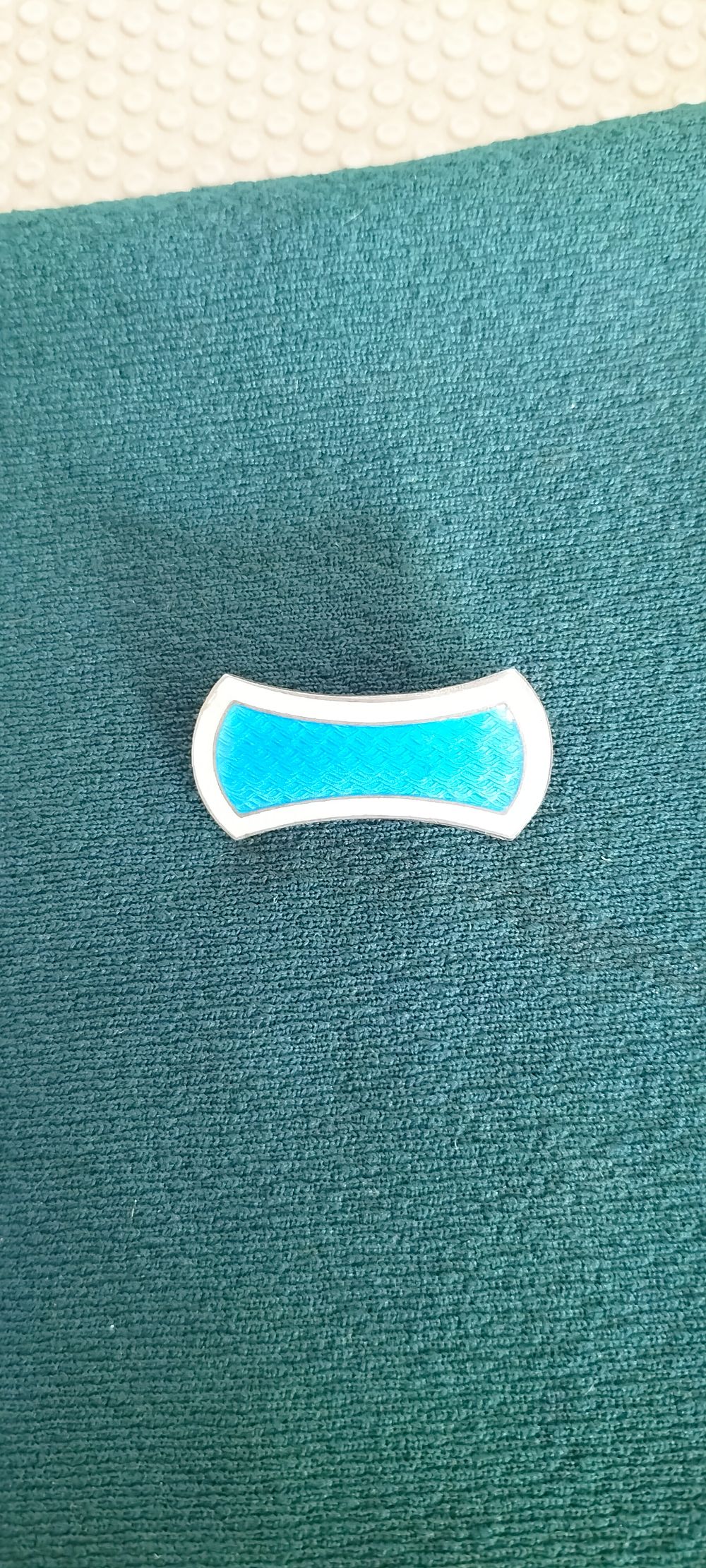 Lot 159 – A Vintage Silver and Cyan Guilloché Enamel Bar Brooch