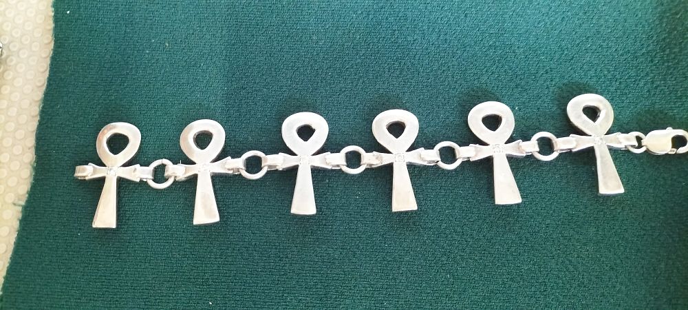 Lot 165 – Silver Egyptian Ankh Motif Link Bracelet with Clear Stone Accents