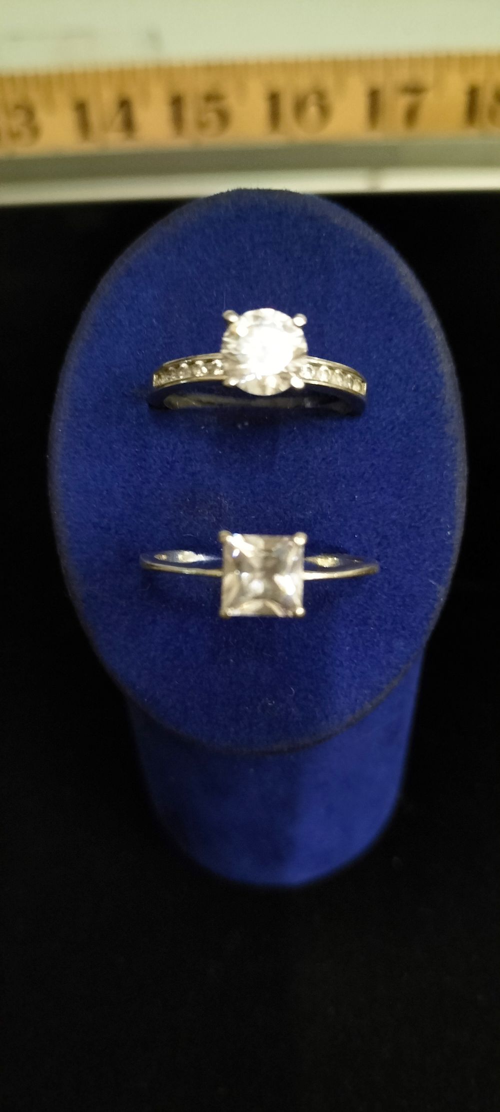 Lot 172 – Two Silver solitaire rings set with colourless stones