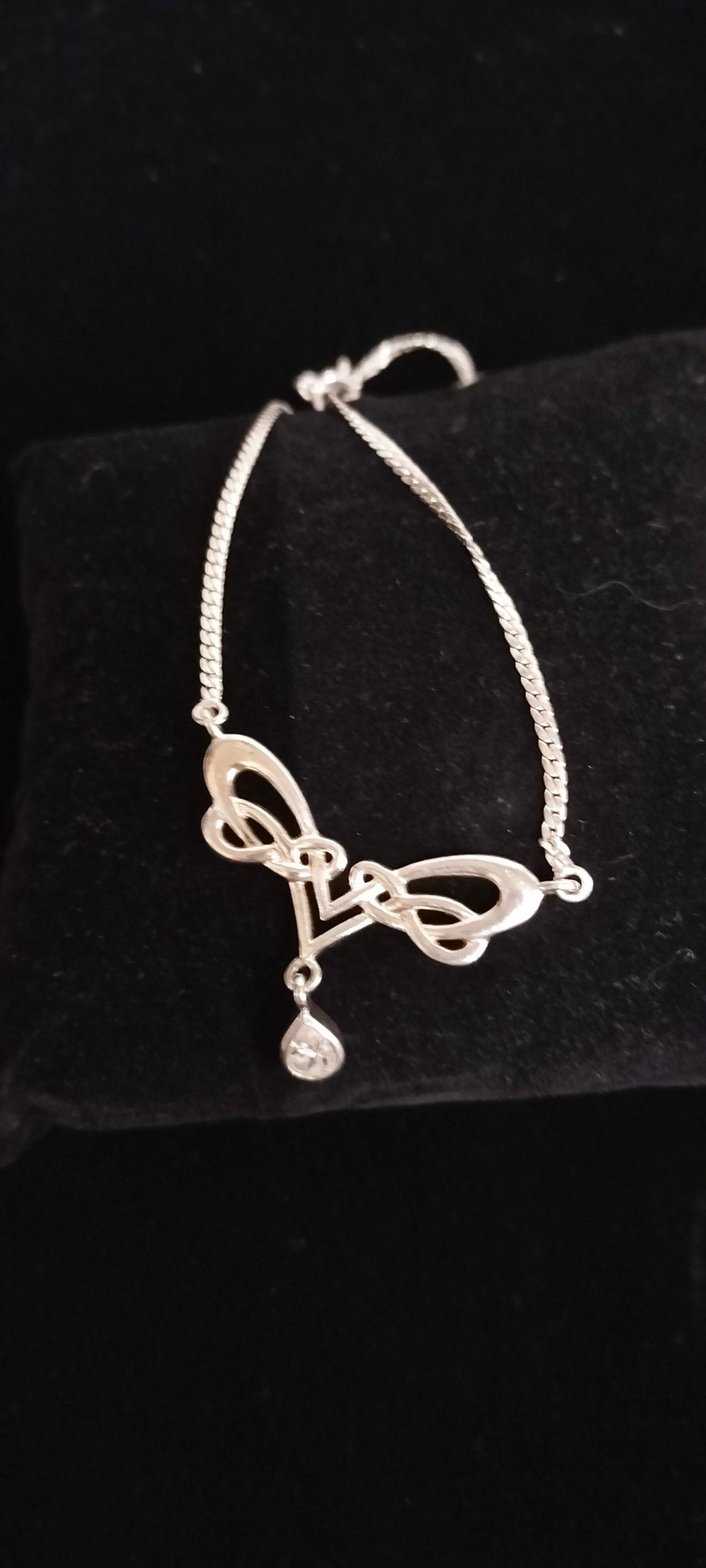 Lot 176 – Sterling Silver Celtic Inspired Heart Motif Necklace with Pear Cut Stone Drop