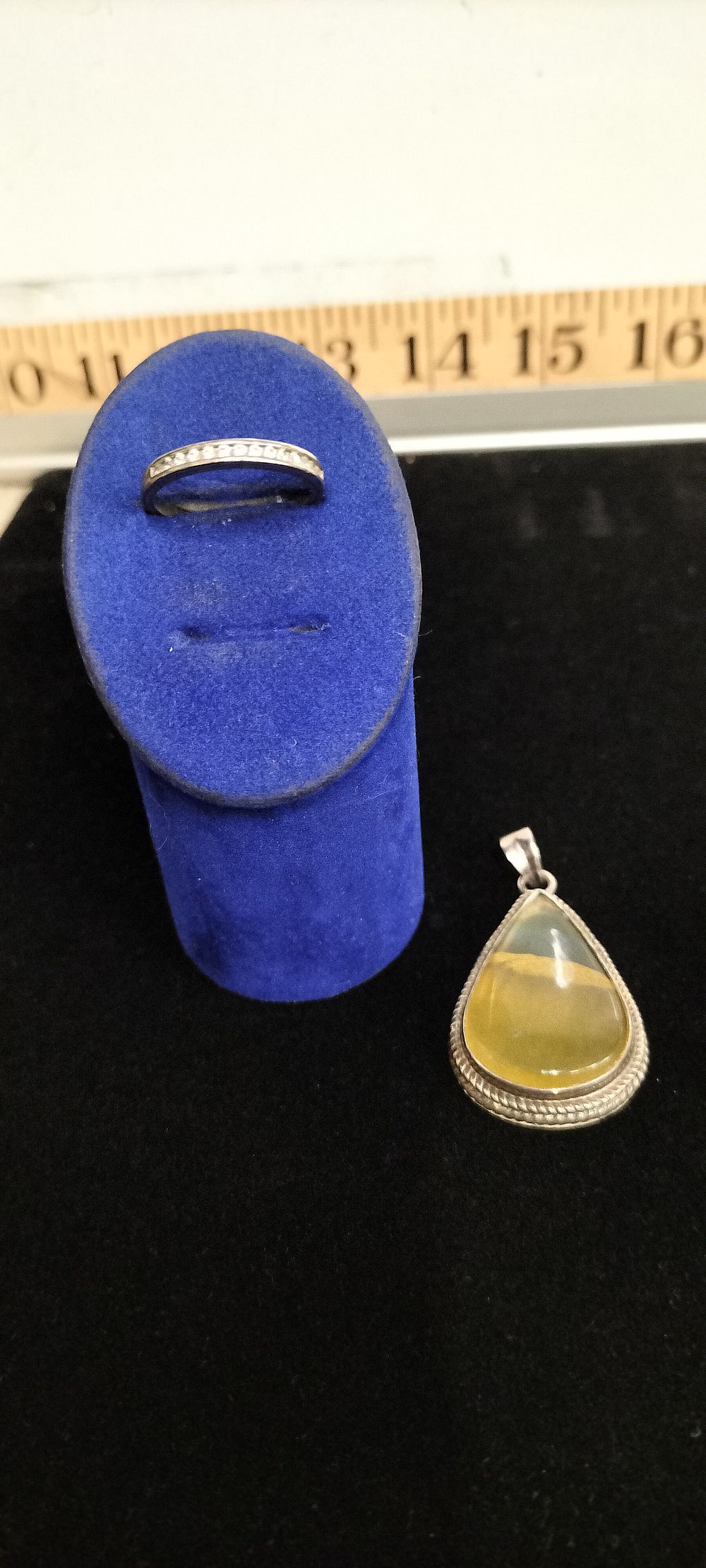 Lot 185 – Two Items of Sterling Silver Jewellery comprising a Band Ring and a Banded Stone Pendant