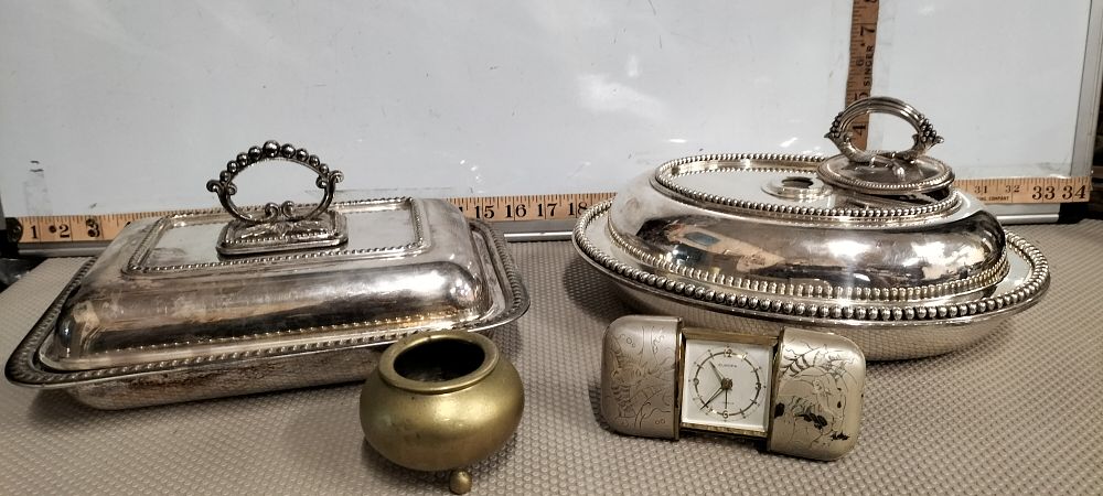 Lot 189 – A Collection of Silver-Plated Tableware, a Europa Travel Clock, and Metalware
