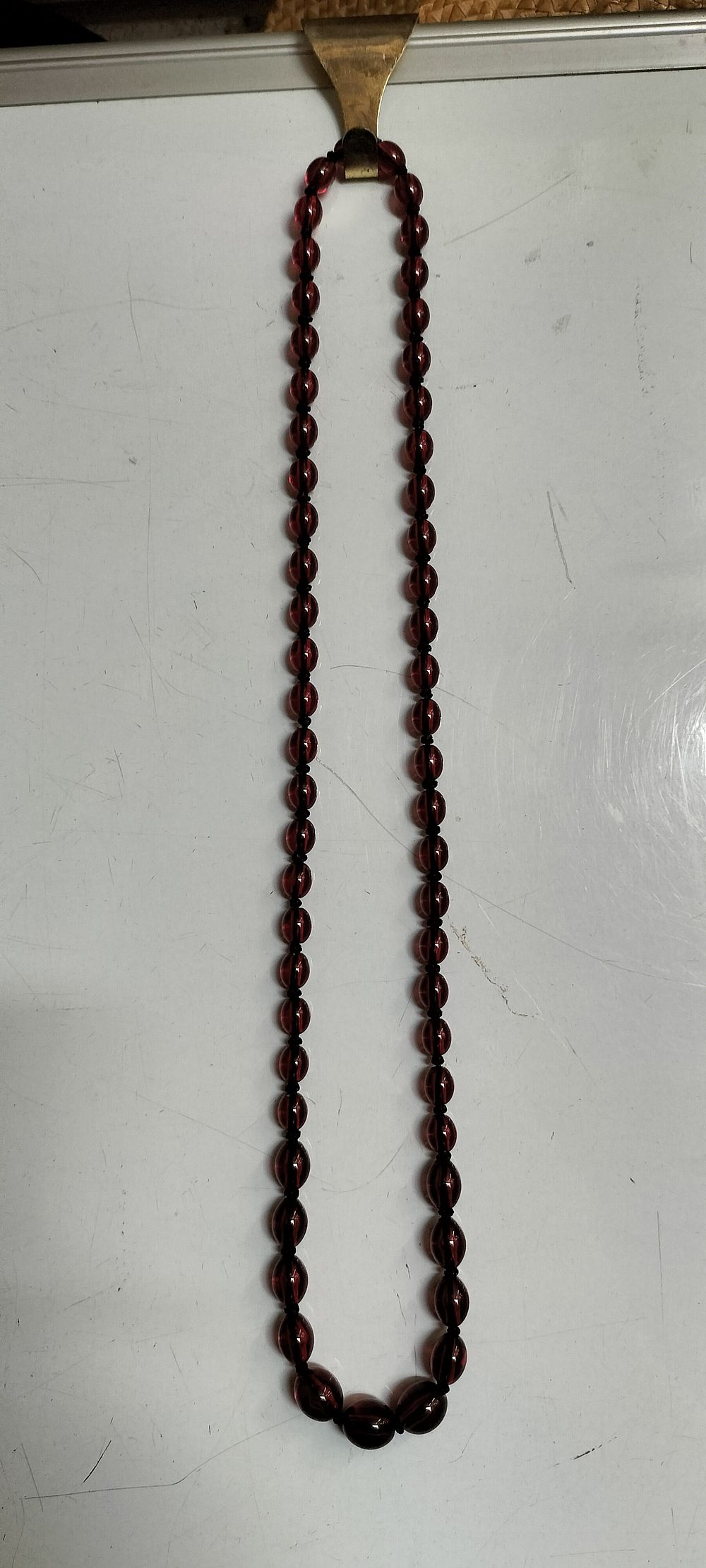 Lot 162 – A Graduated Cherry Amber Bead Necklace