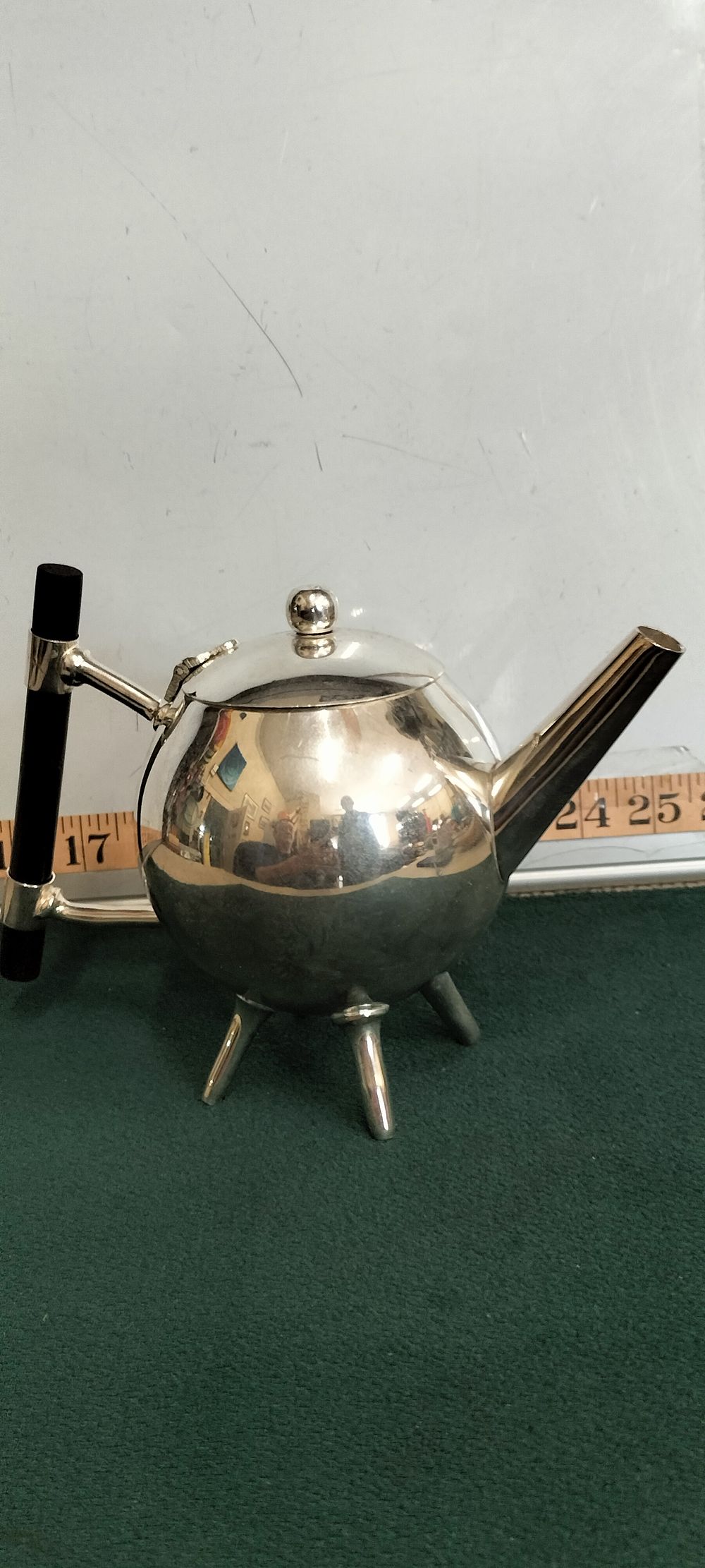 Lot 191 – A Silver Plated Christopher Dresser Style Spherical Teapot