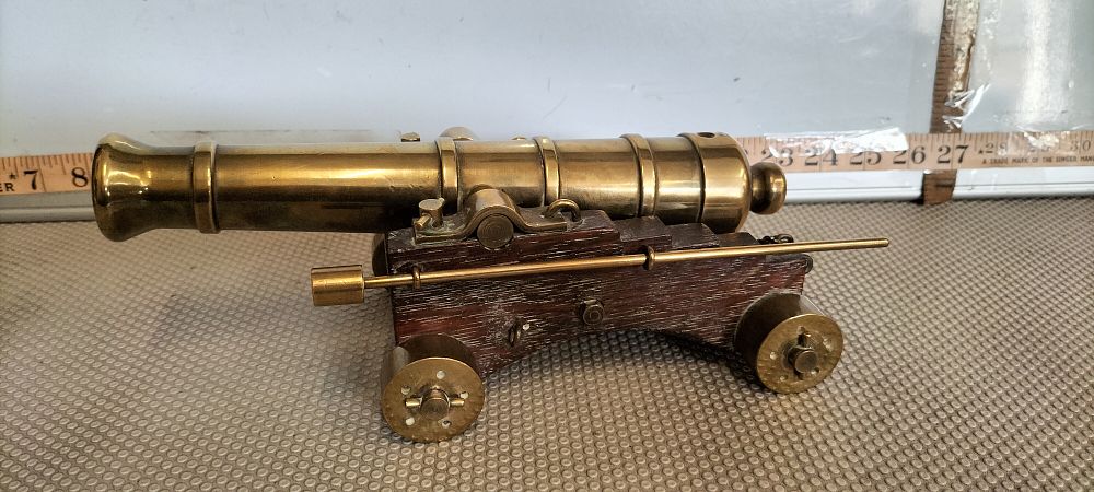 Lot 201 – A Brass Model Naval Signal Cannon on a Wooden Carriage