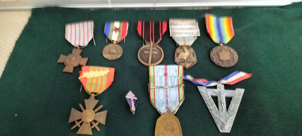 Lot 214 – Nine Bronze and Silver WWII Free French Military Medals and Insignia