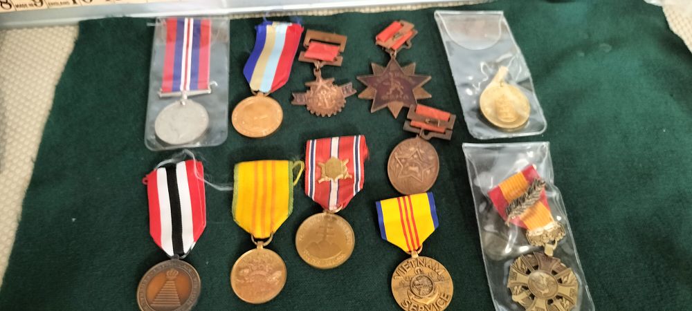Lot 219 – A Collection of Bronze and Silver International Military Service Medals