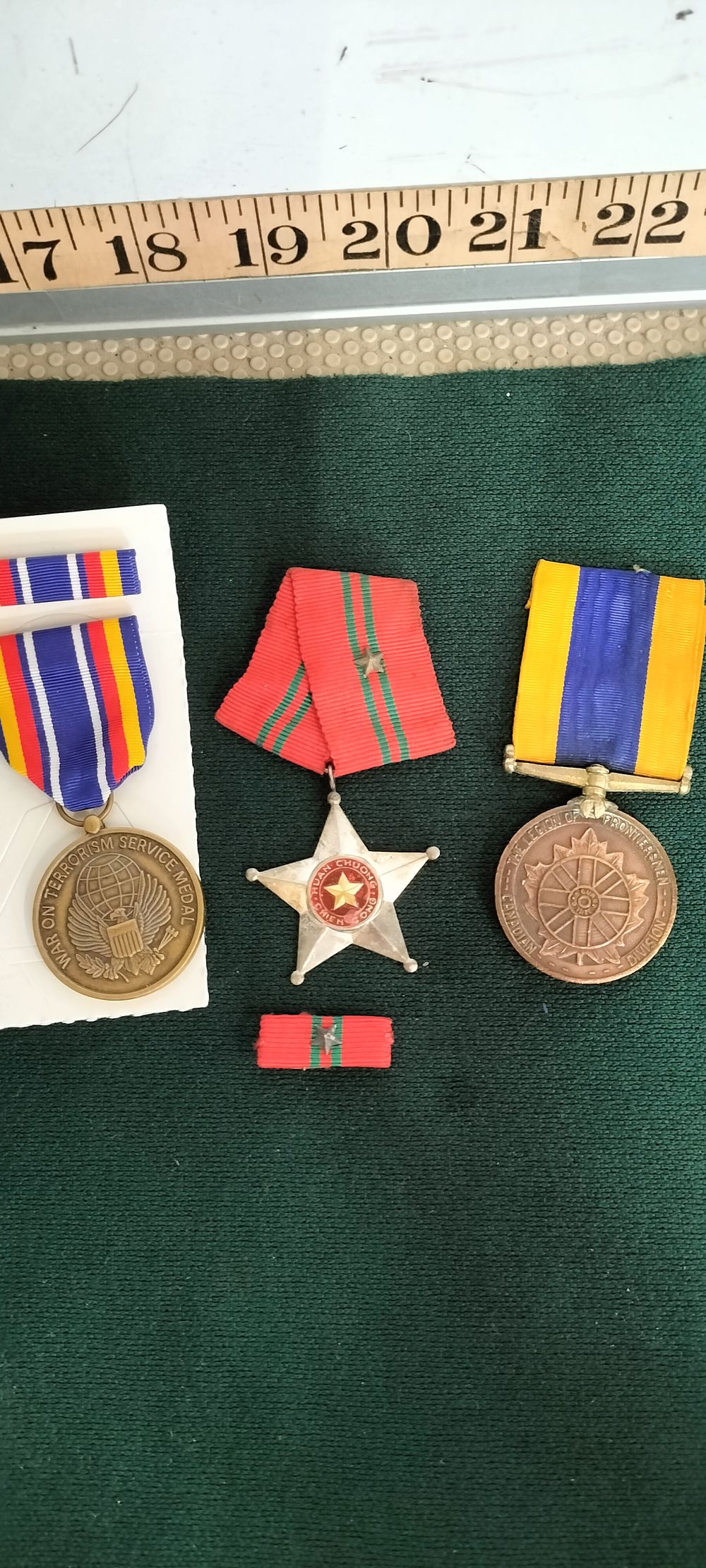 Lot 232 – A Trio of Bronze and Silver coloured Military and Paramilitary Medals
