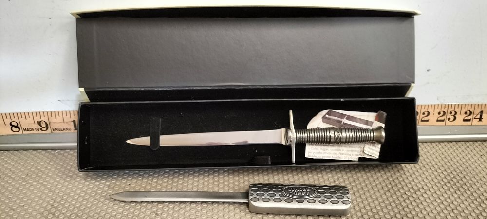 Lot 242 – Two Pewter and Steel Celtic Dagger and Land Rover Letter Openers