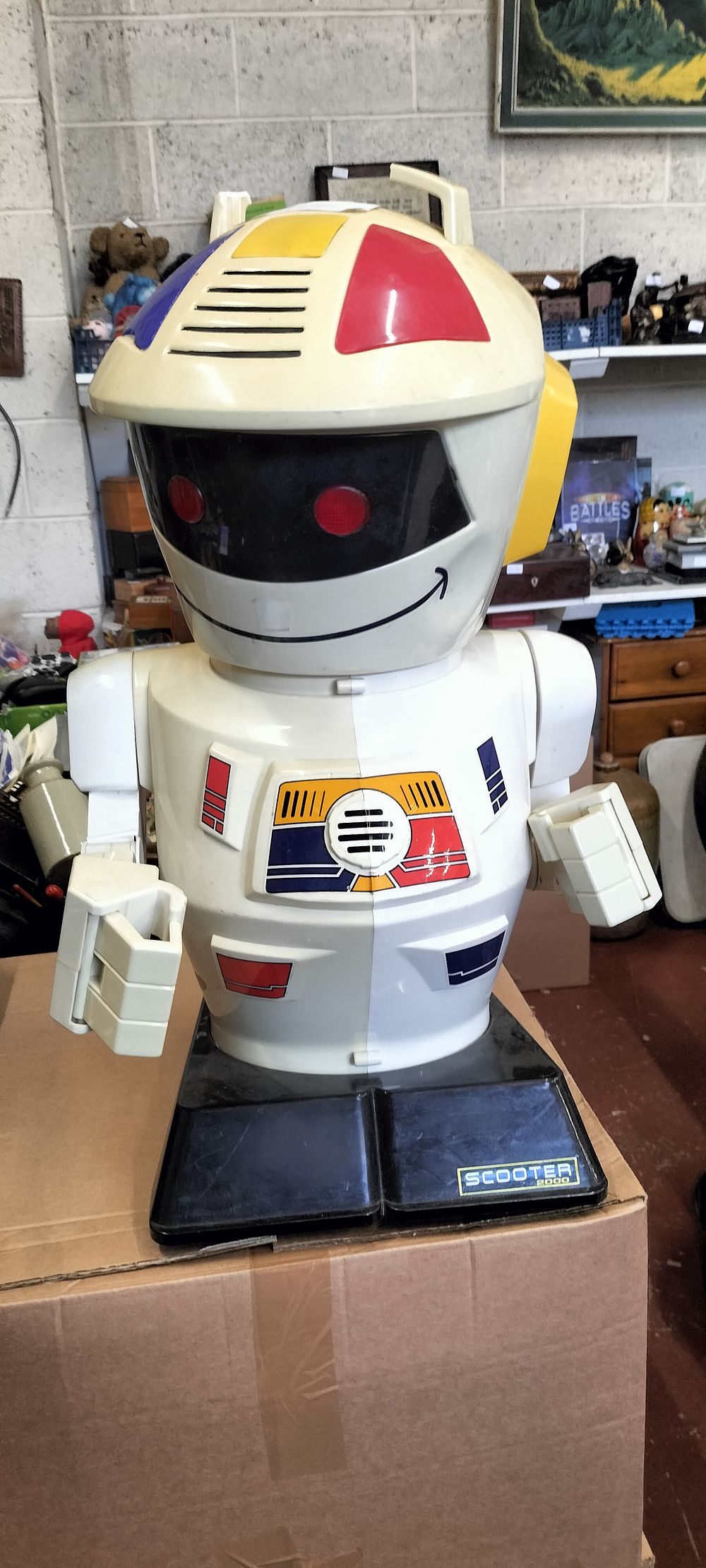Lot 261 – A Plastic Vintage Electronic Programmable Scooter 2000 Robot
