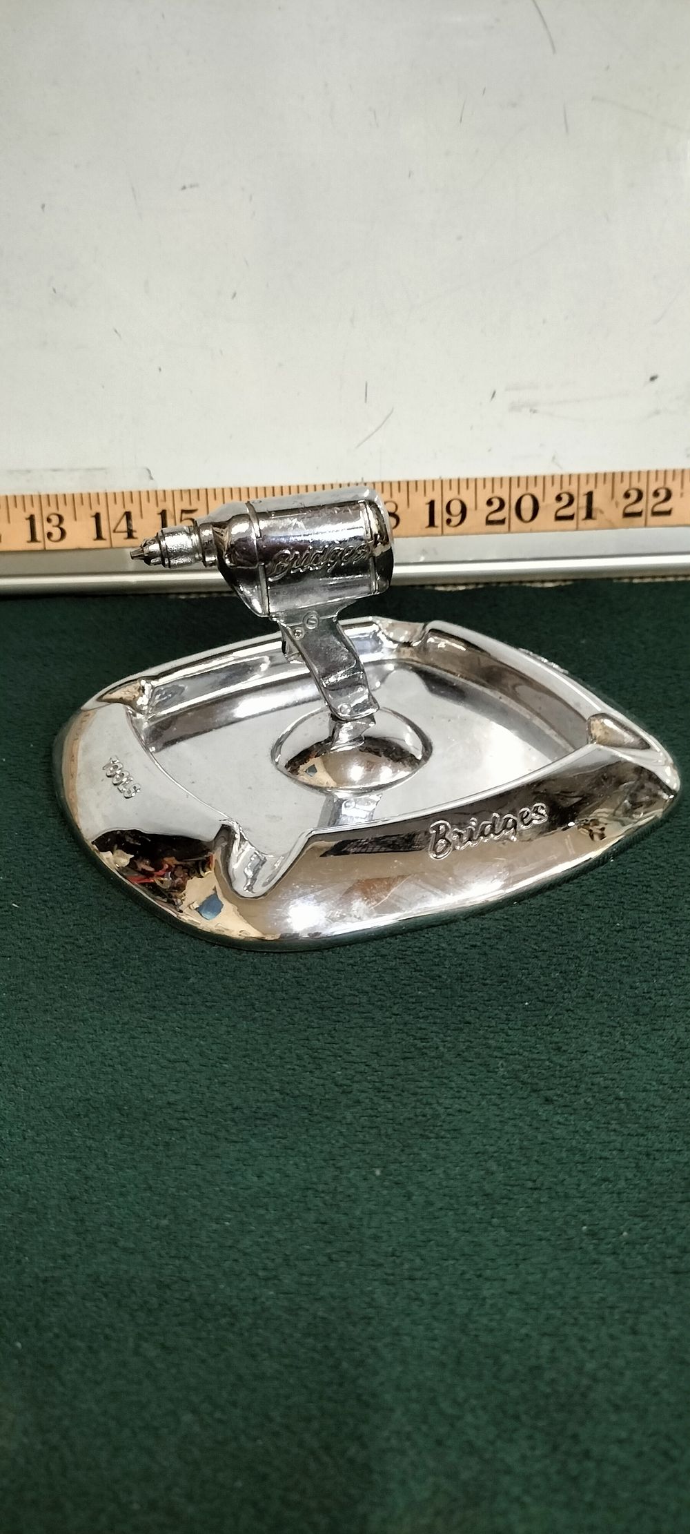 Lot 275 – A Chrome Plated Bridges Tools Promotional Drill Motif Ashtray