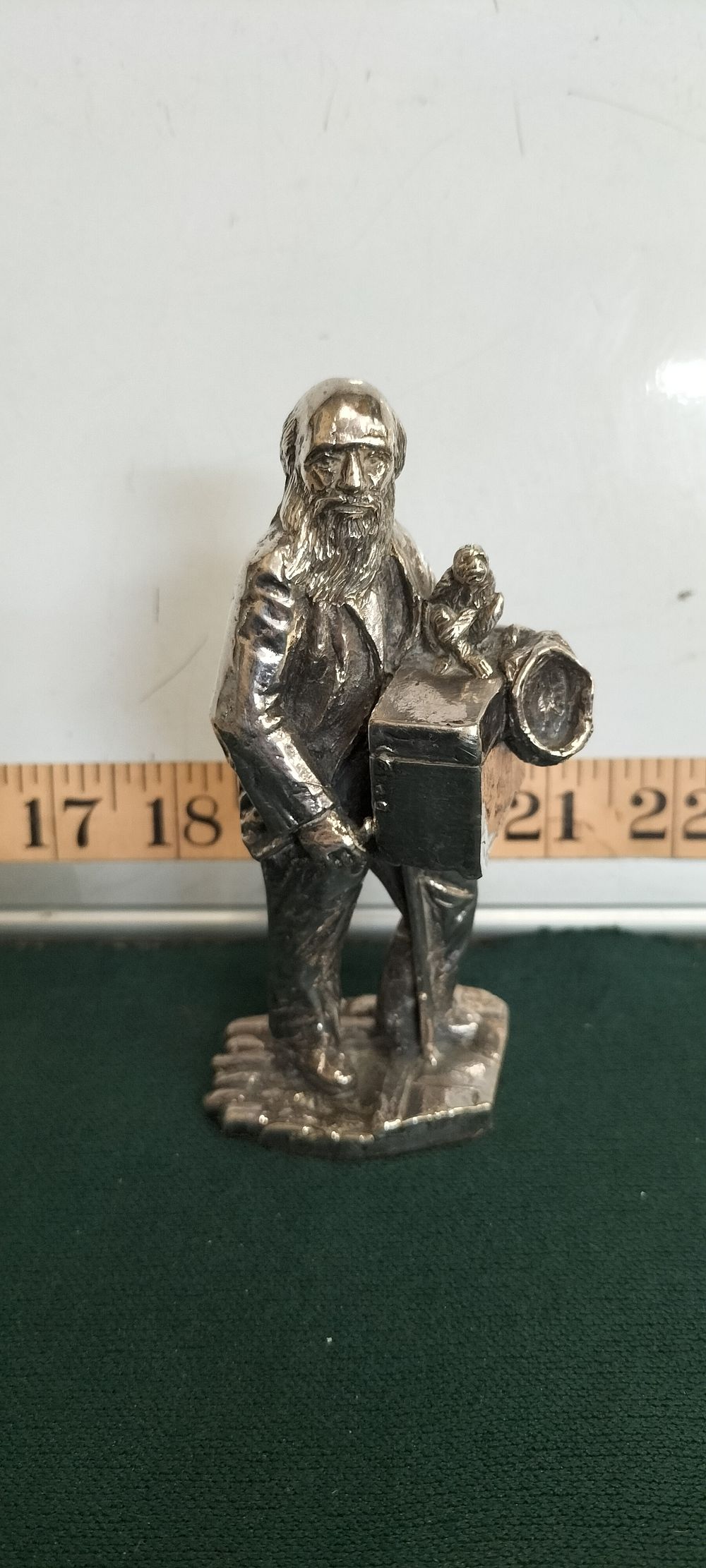 Lot 182 – A Silver metal Organ Grinder and Monkey Figurine