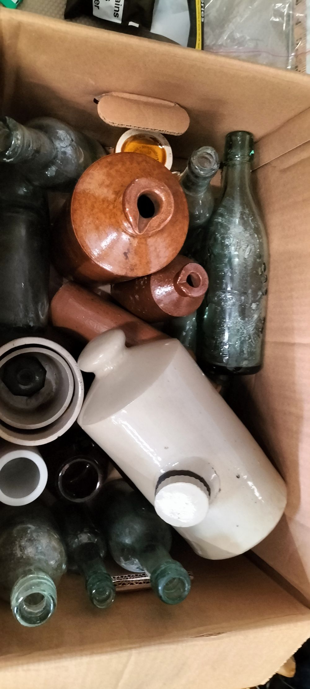 Lot 184 – A Glass and Stoneware Collection of Vintage Bottles and Jars