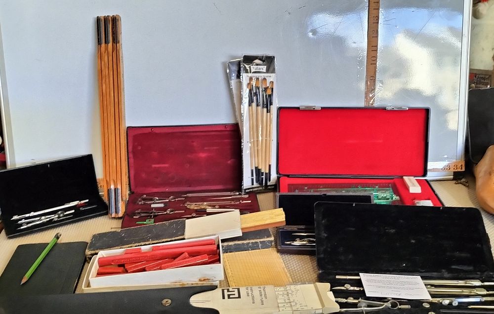 Lot 154 – An Assortment of Vintage Drafting Instruments Slide Rules and Artist Brushes
