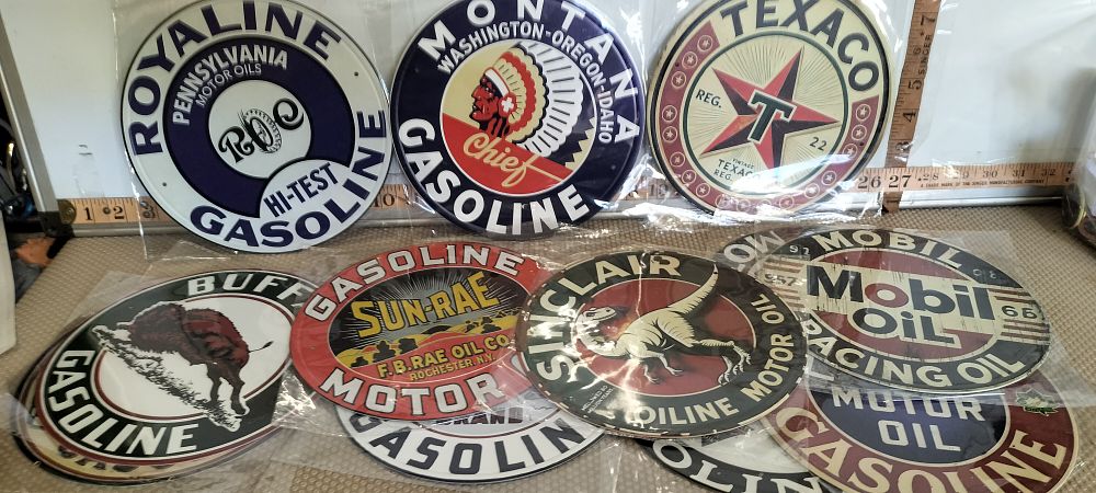 Lot 14 – A Collection of Printed Metal Advertising Signs Featuring Historic Petroleum Brands